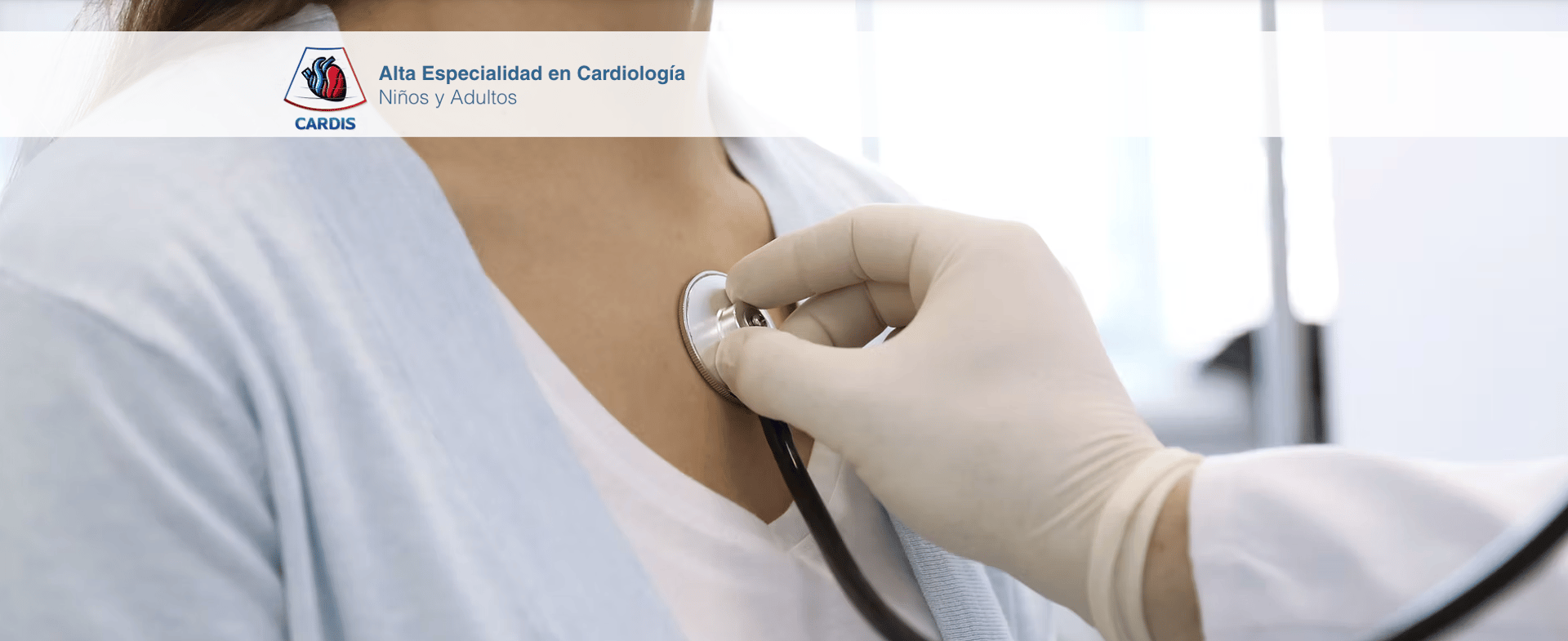 a woman in a white shirt holding a stethoscope