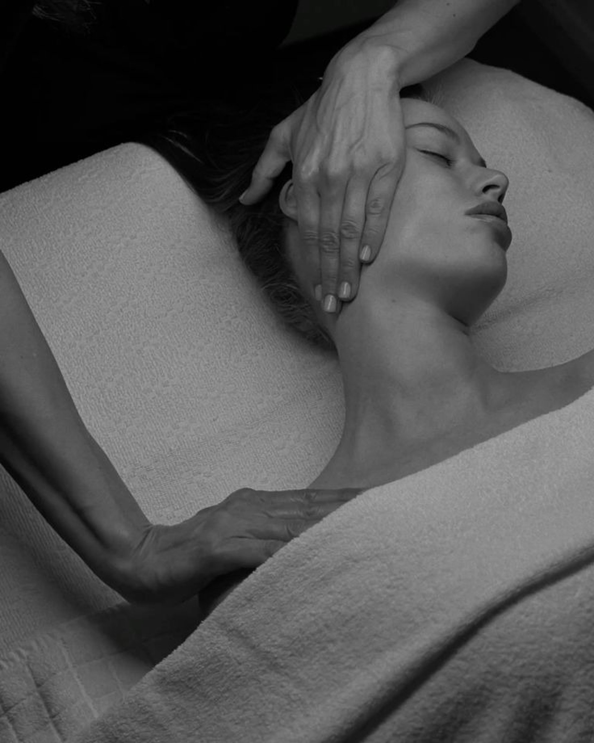 an abstract photo of a curved building with a blue sky in the background