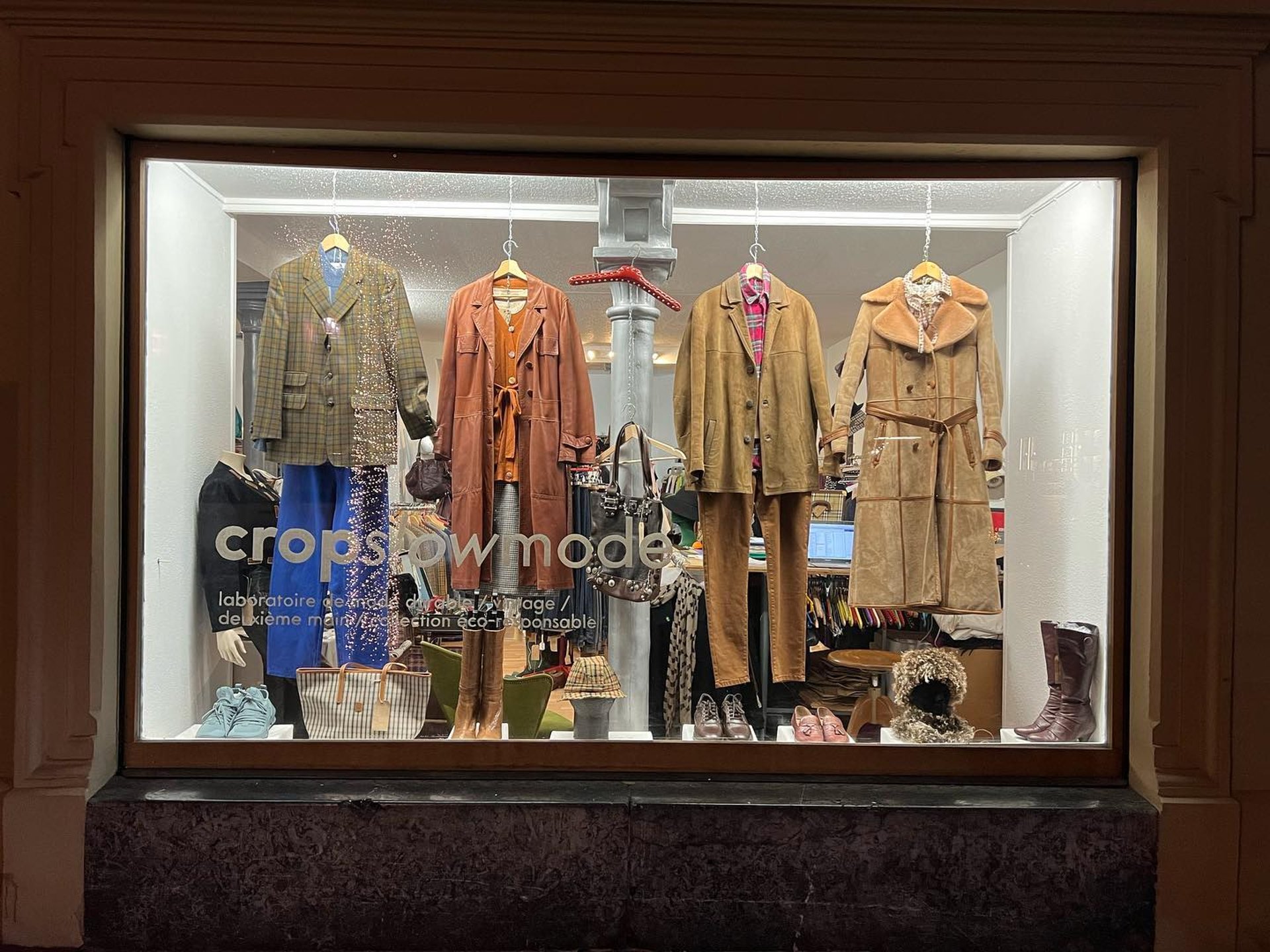 an abstract photo of a curved building with a blue sky in the background