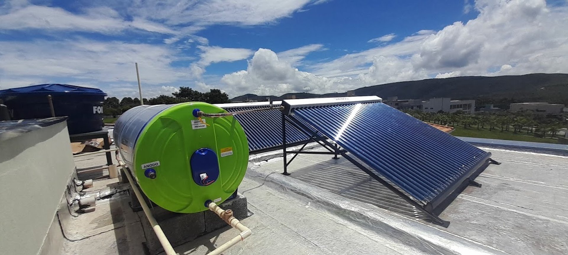 windmills on grass field at daytime