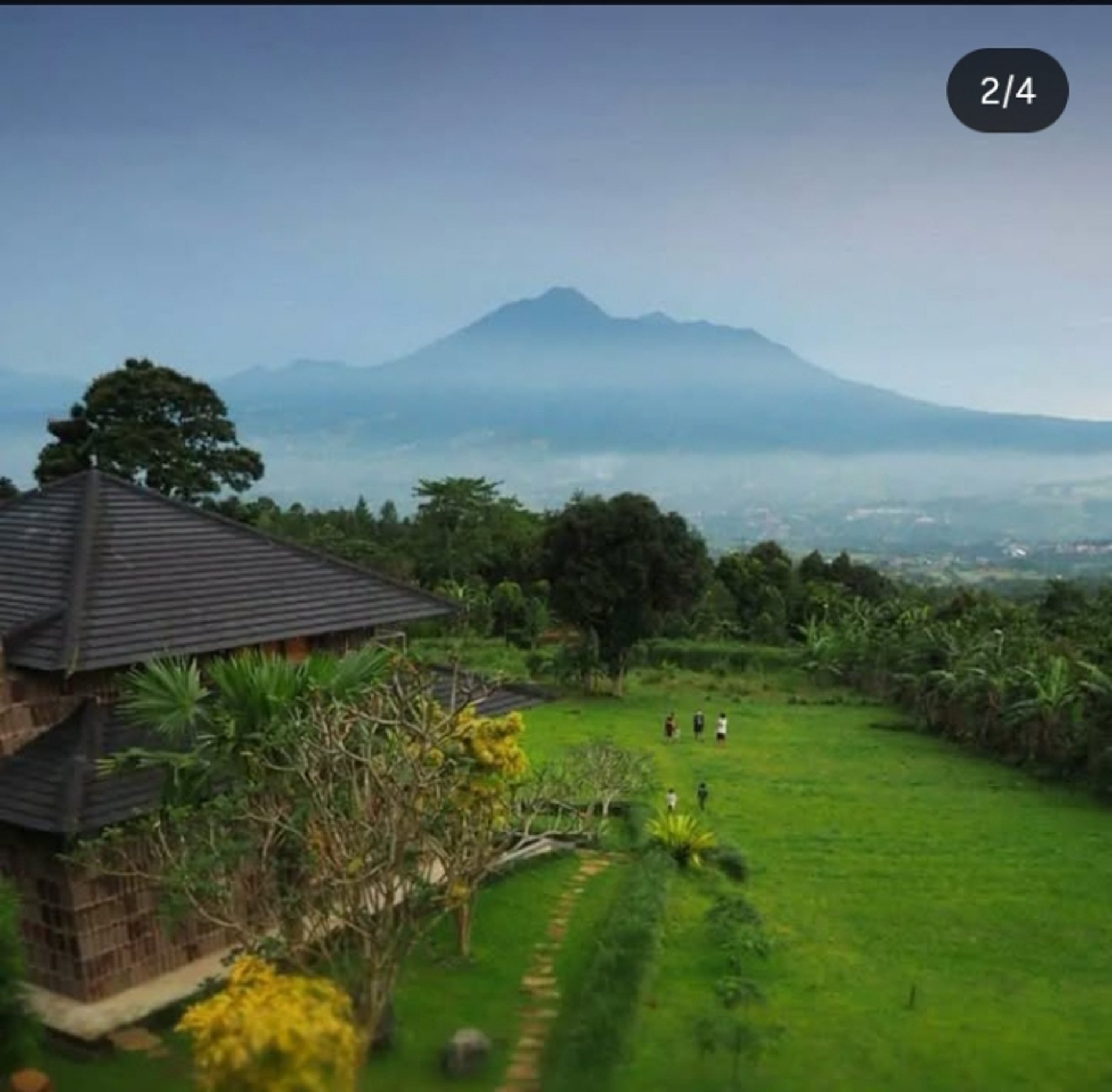 black and brown leather padded tub sofa