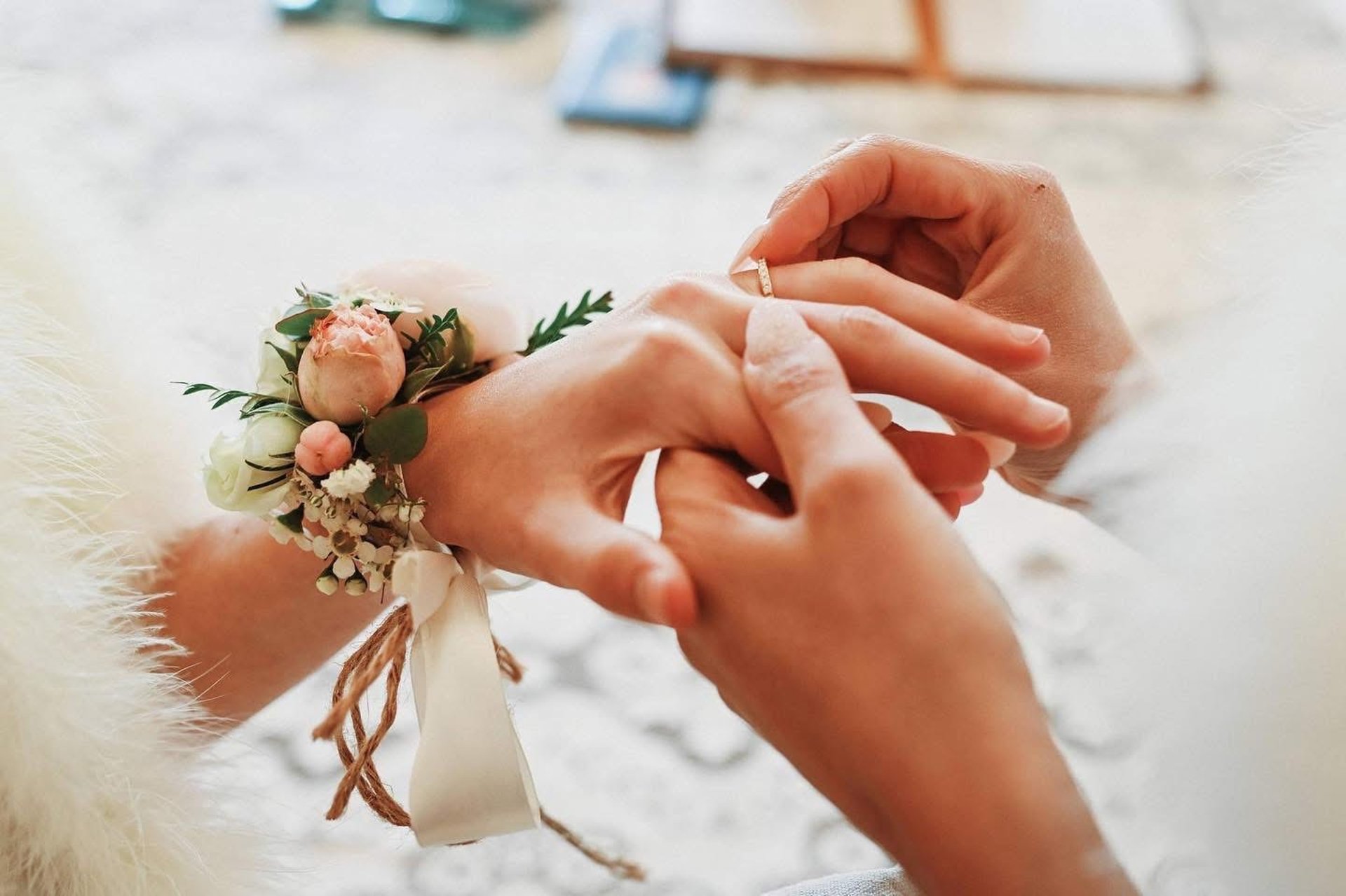 couple wearing silver-colored rings