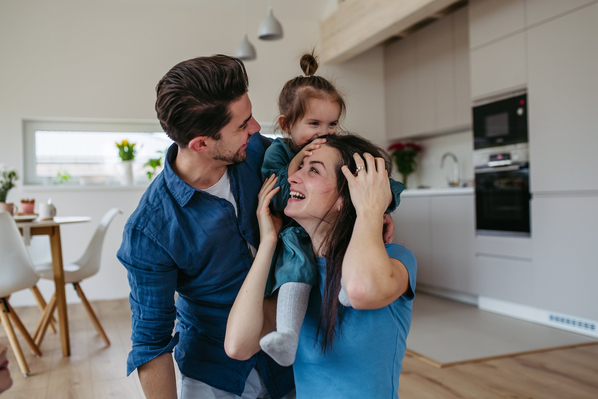 a person stacking coins on top of a table