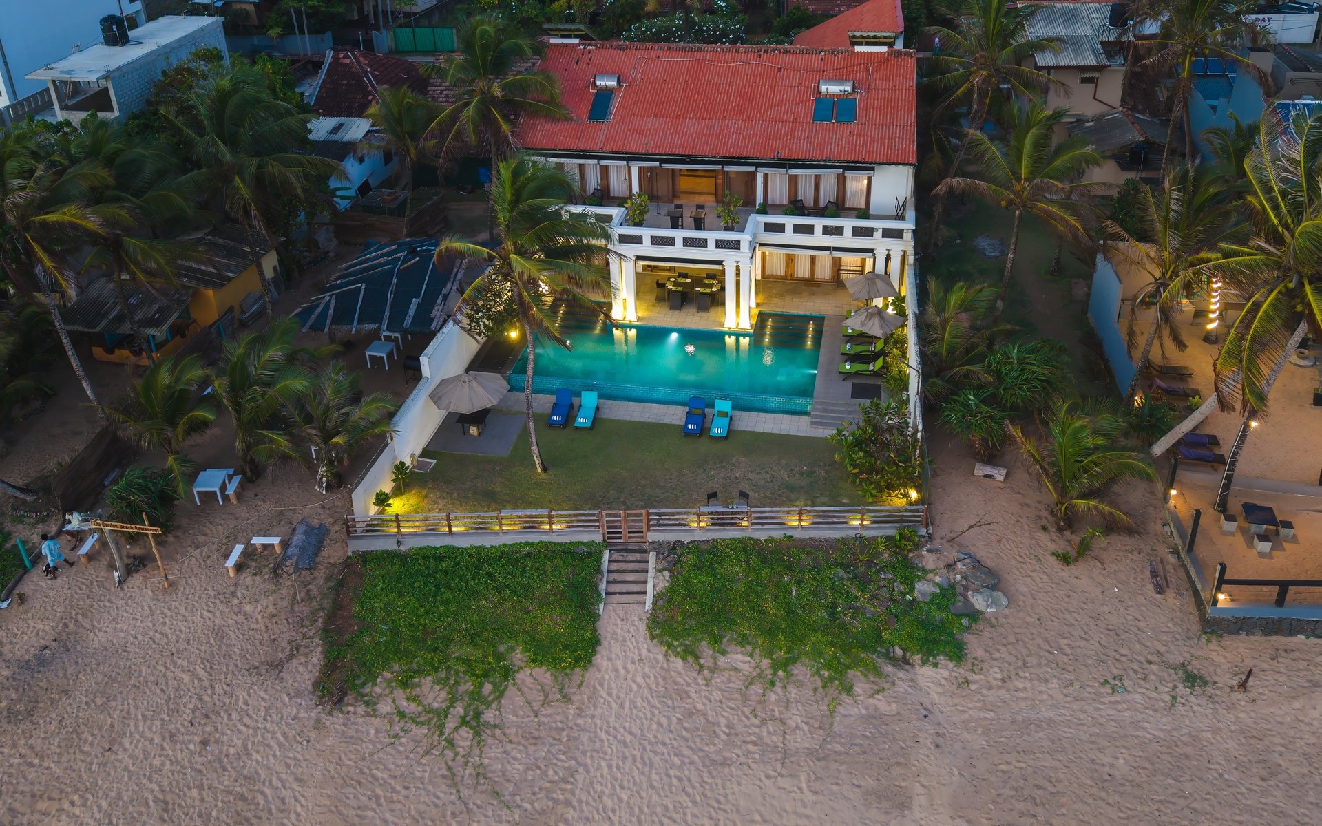 an abstract photo of a curved building with a blue sky in the background