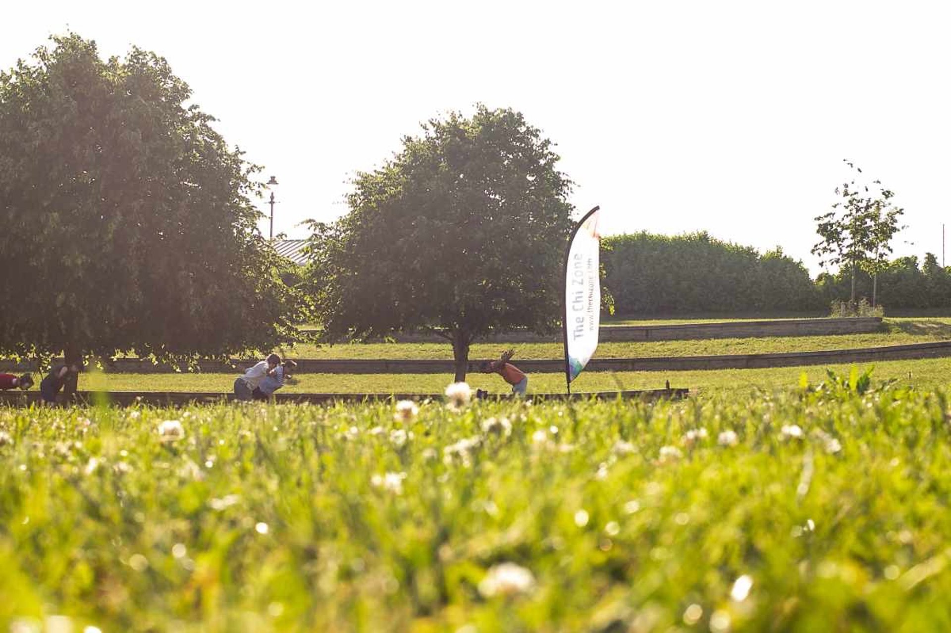 woman wearing yellow long-sleeved dress under white clouds and blue sky during daytime