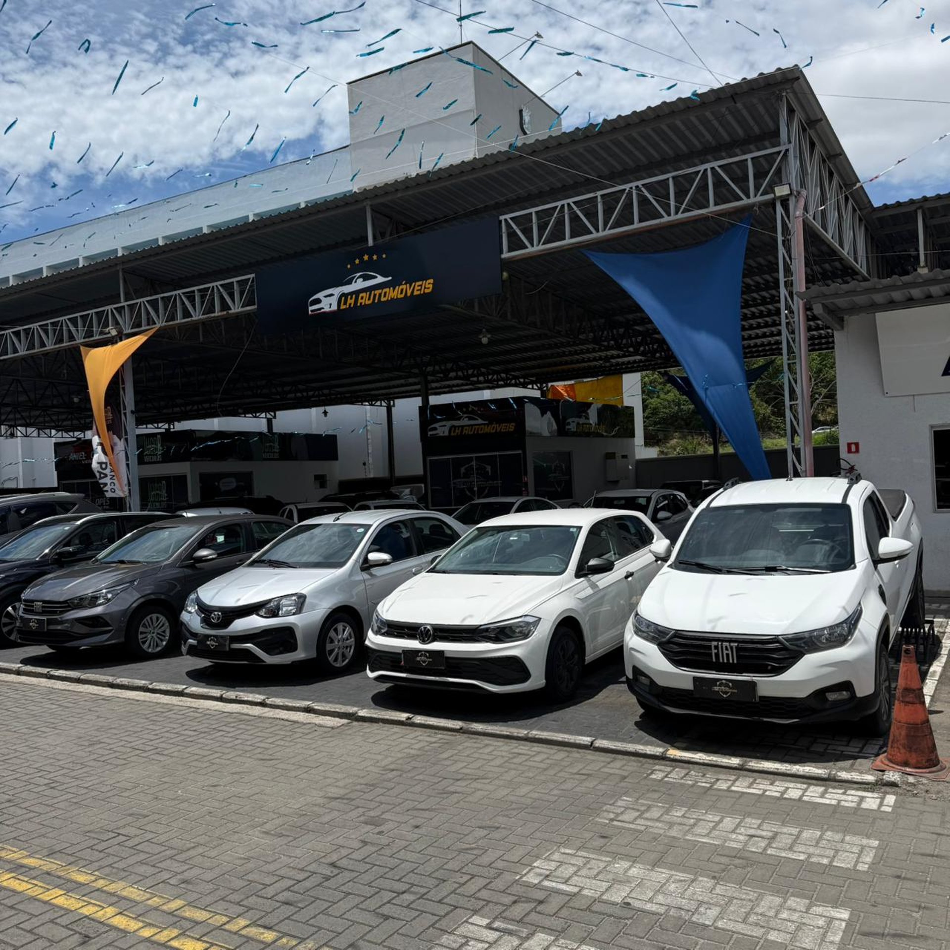 woman wearing yellow long-sleeved dress under white clouds and blue sky during daytime