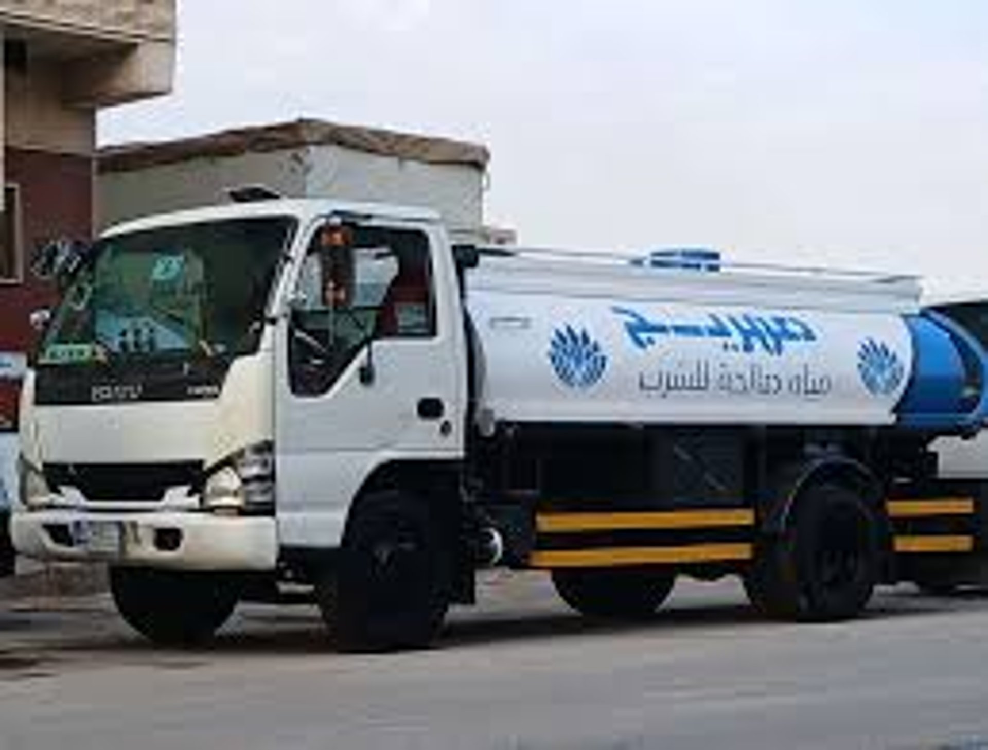 black and brown leather padded tub sofa
