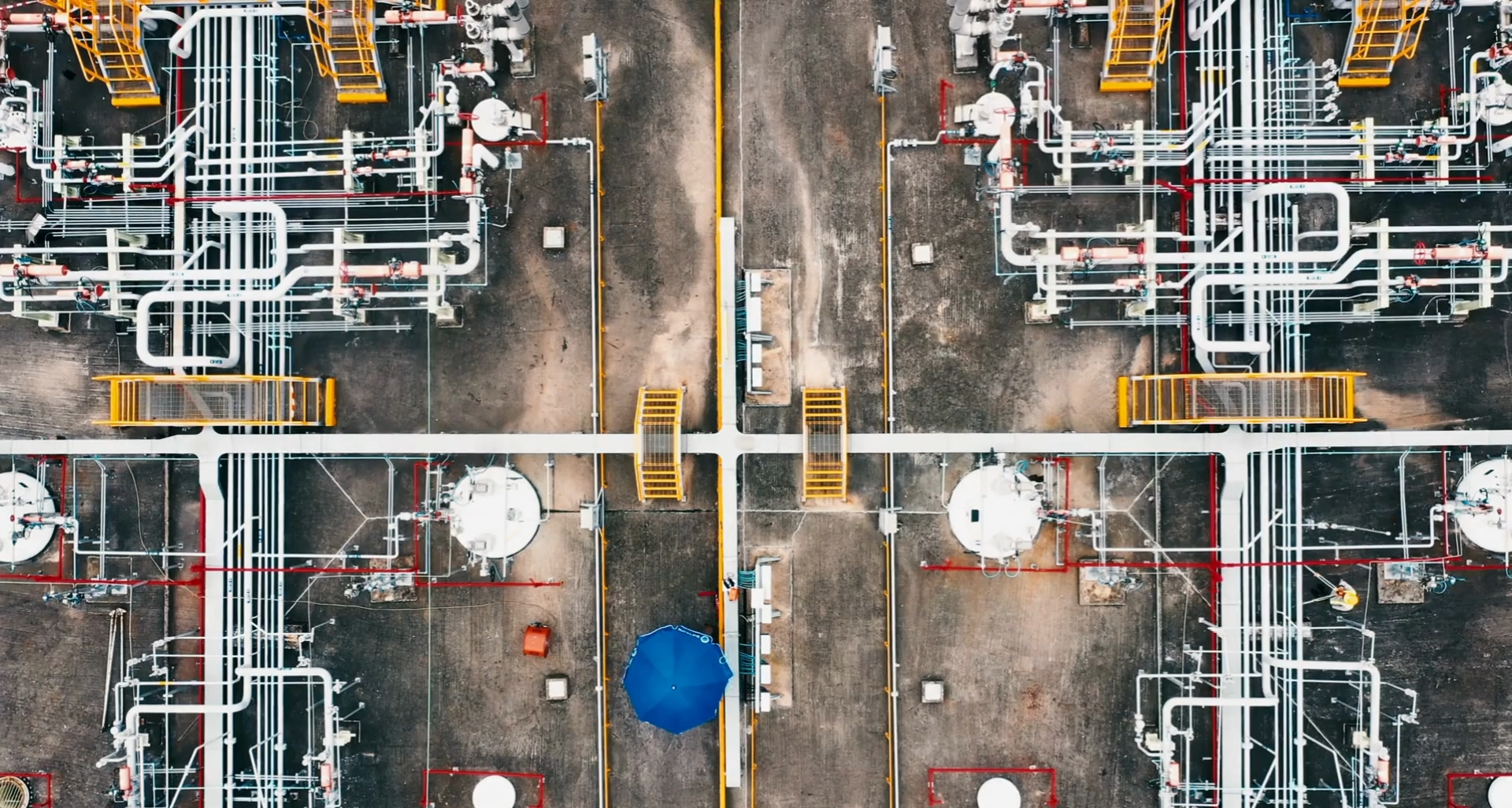 seven construction workers standing on white field