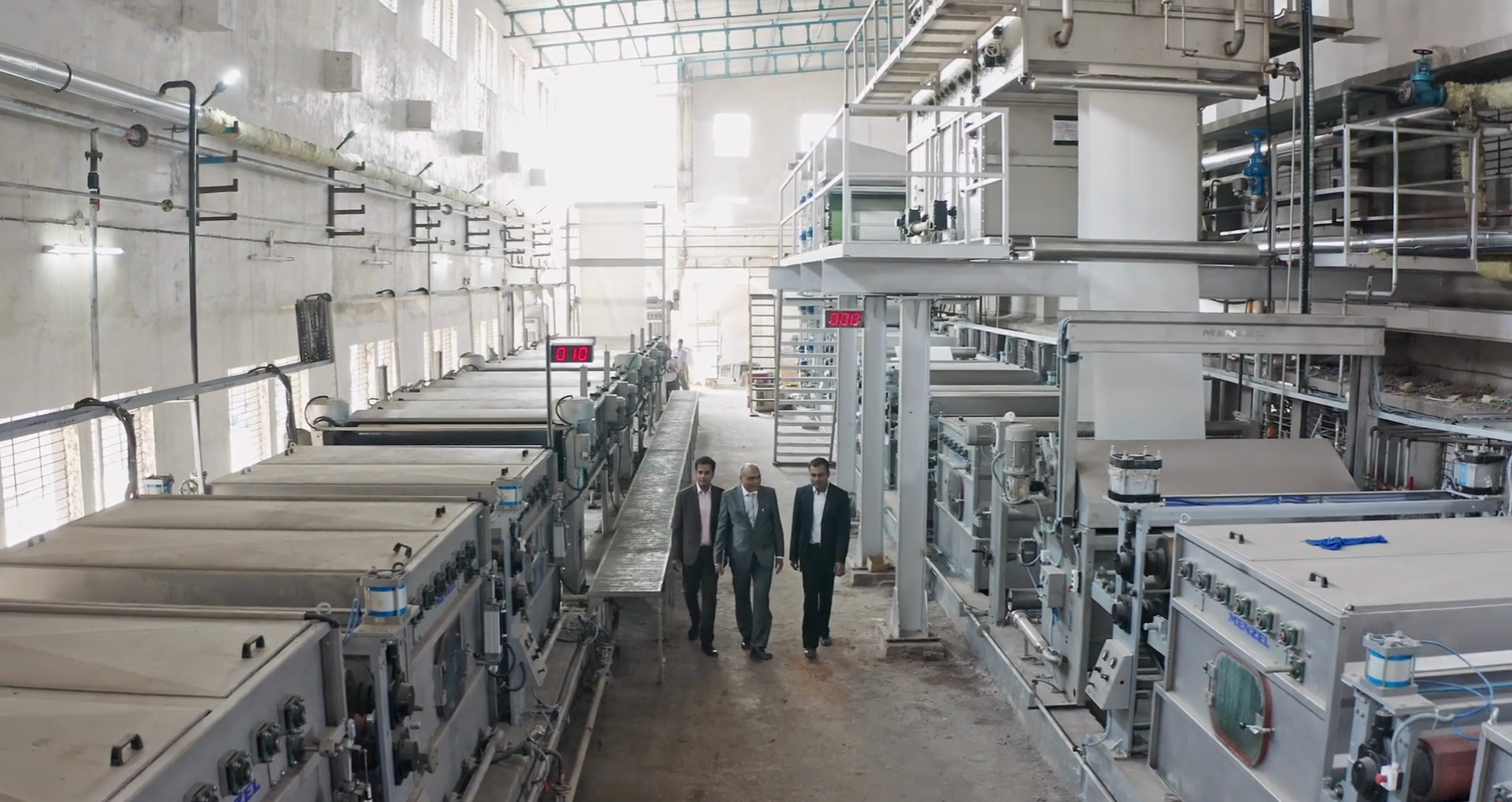 seven construction workers standing on white field