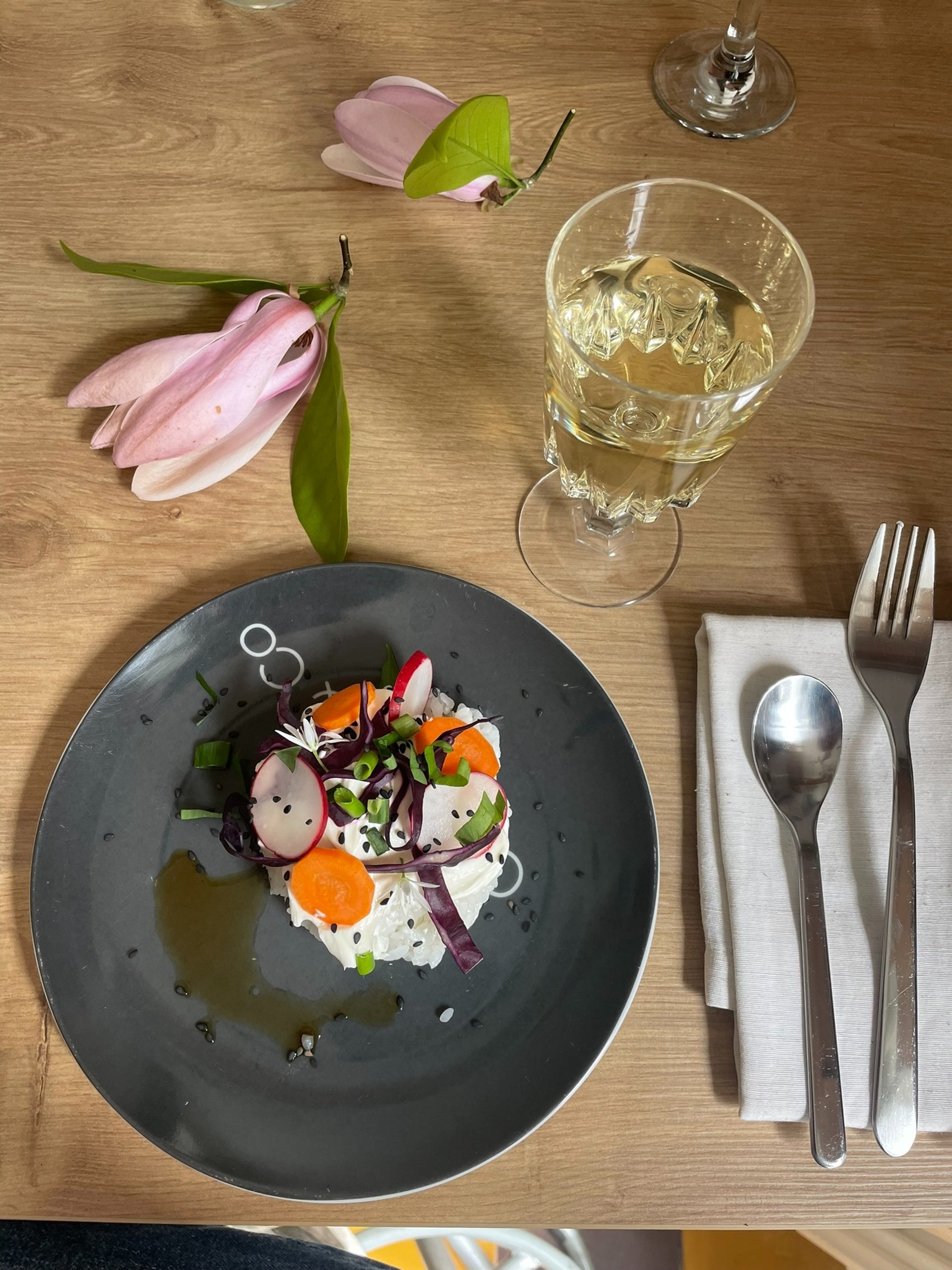 an abstract photo of a curved building with a blue sky in the background