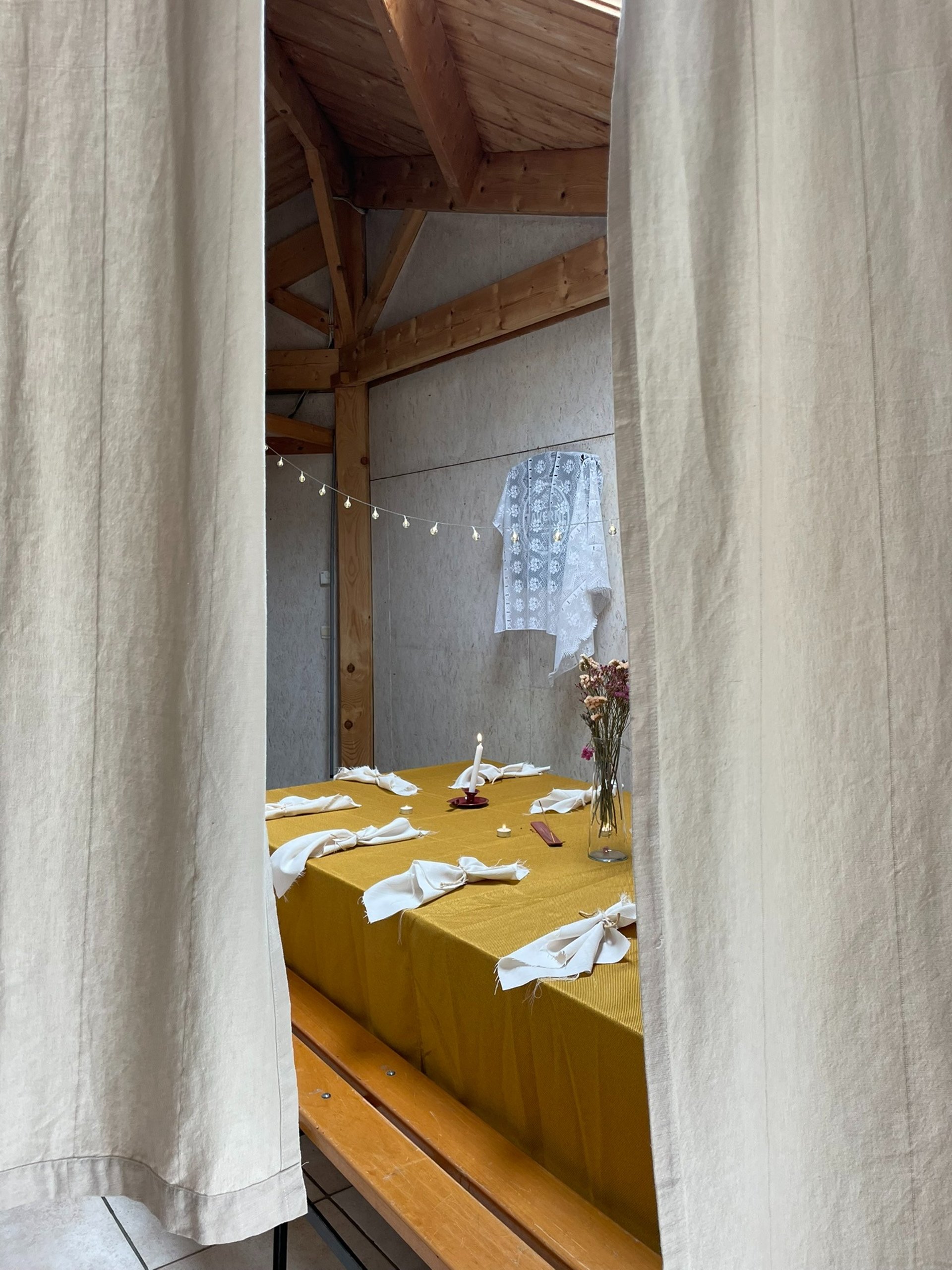an abstract photo of a curved building with a blue sky in the background
