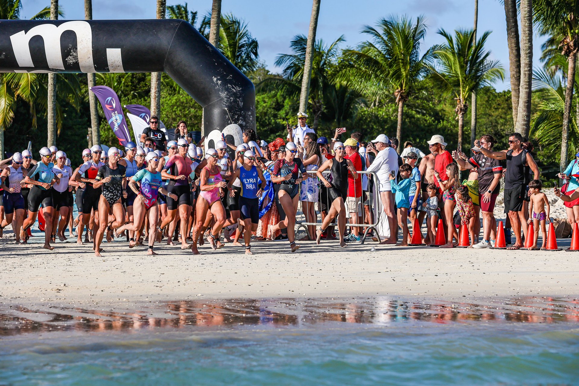 woman wearing yellow long-sleeved dress under white clouds and blue sky during daytime