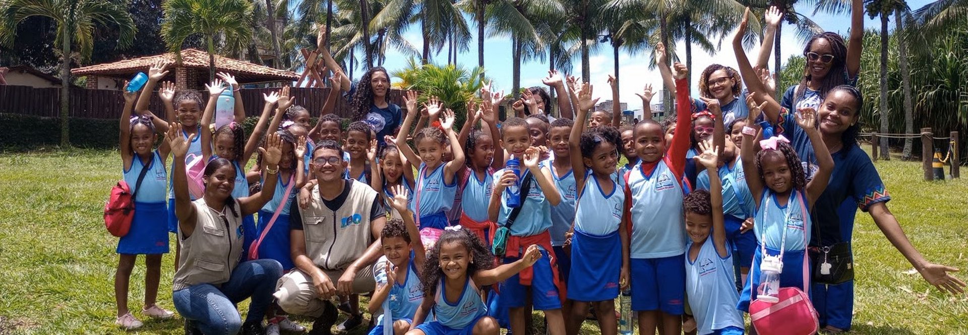 an abstract photo of a curved building with a blue sky in the background