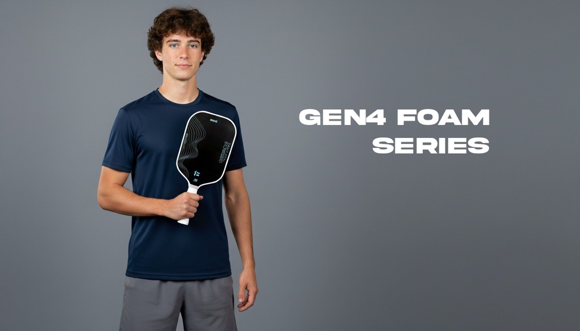 an abstract photo of a curved building with a blue sky in the background