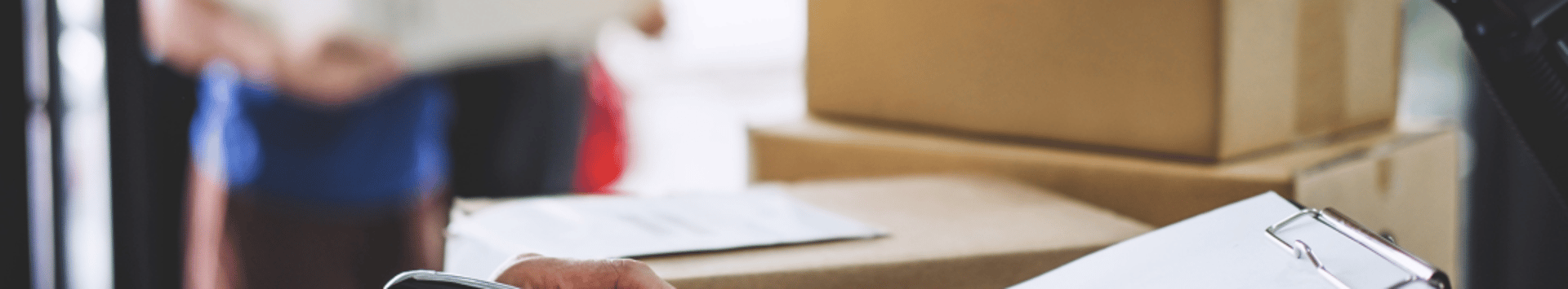 brown cardboard boxes on black plastic crate