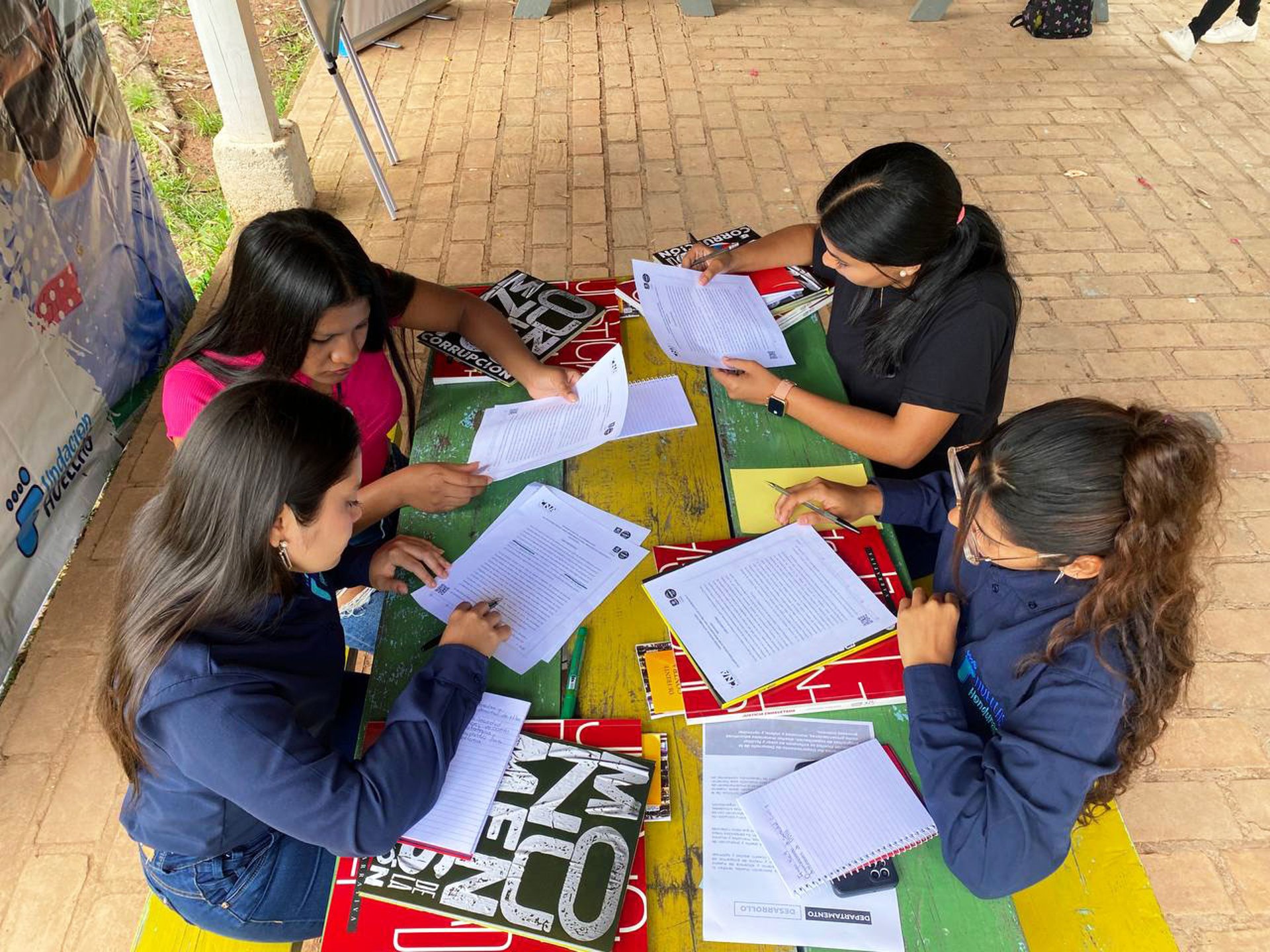 an abstract photo of a curved building with a blue sky in the background