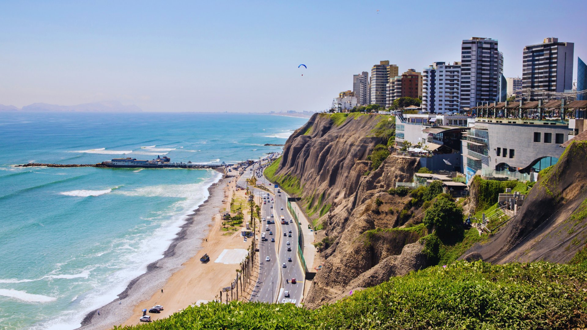 black and brown leather padded tub sofa