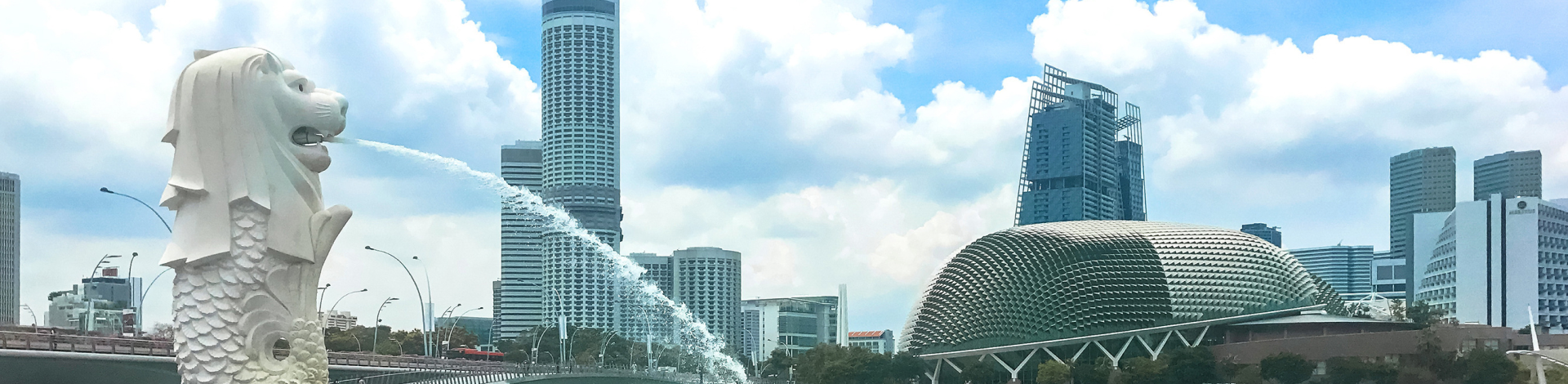city of Singapore under cloudy sky