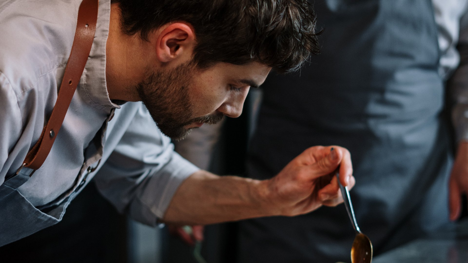 woman wearing yellow long-sleeved dress under white clouds and blue sky during daytime