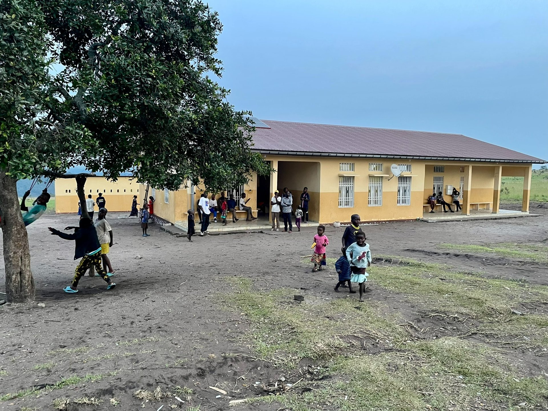 an abstract photo of a curved building with a blue sky in the background