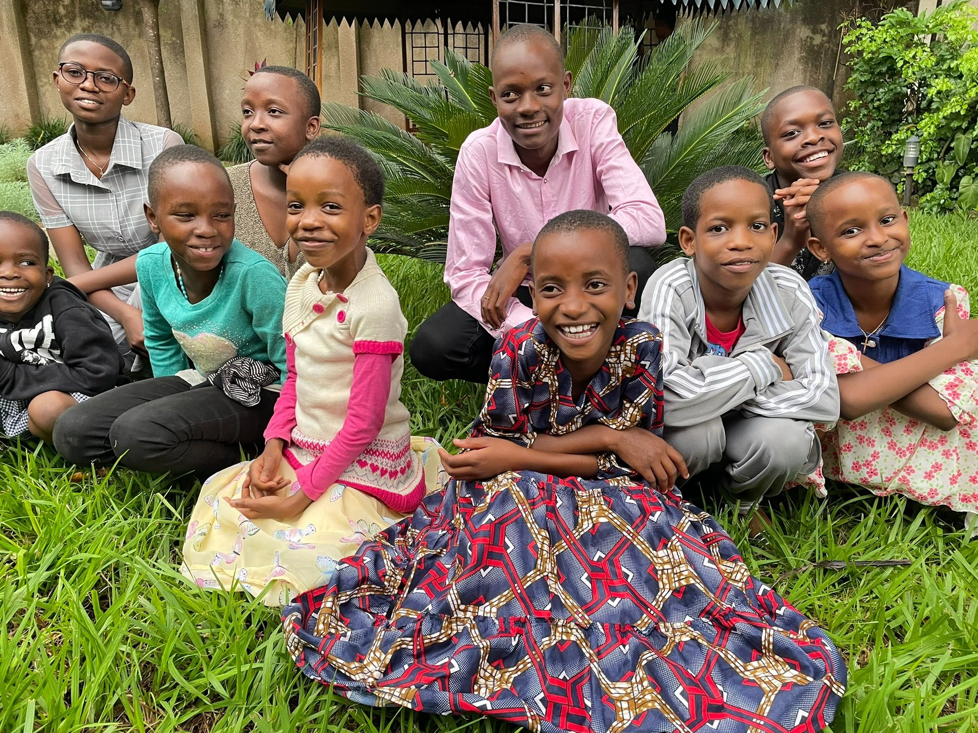 an abstract photo of a curved building with a blue sky in the background