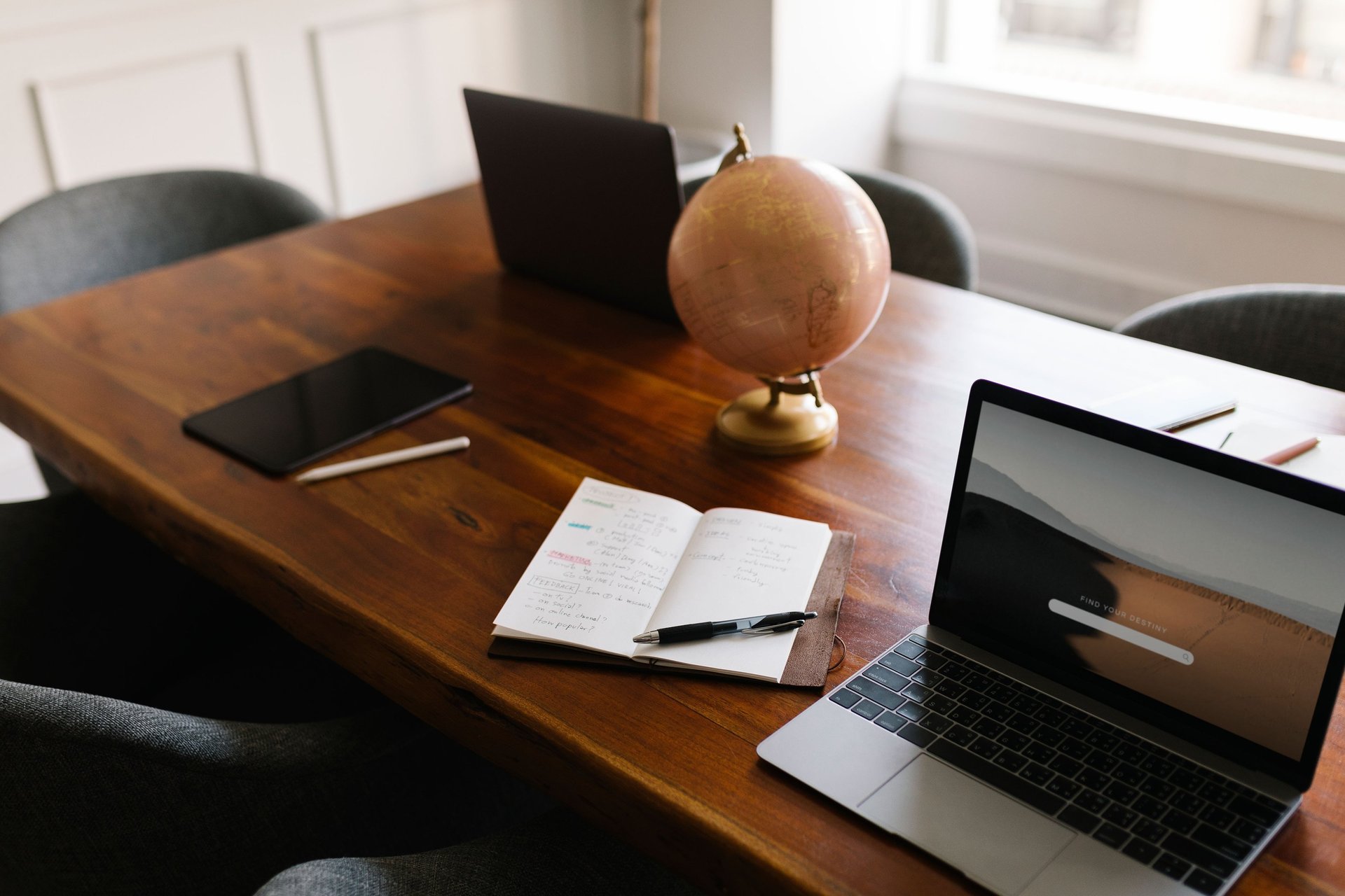 an abstract photo of a curved building with a blue sky in the background