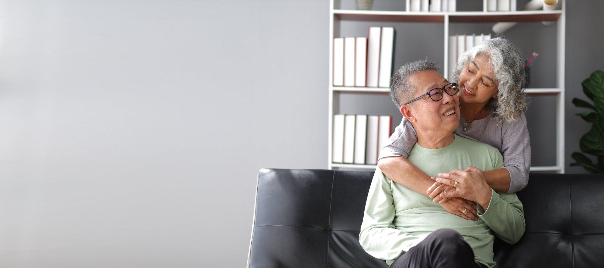 an abstract photo of a curved building with a blue sky in the background