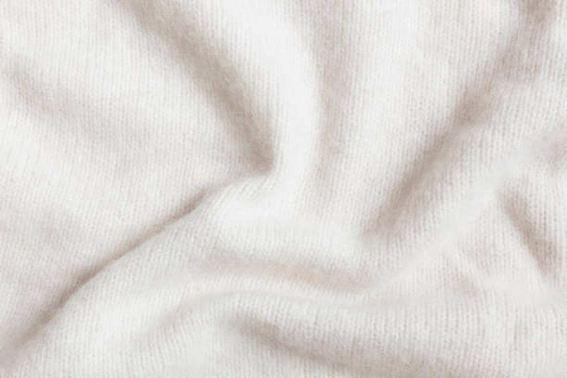 woman in white hijab smiling