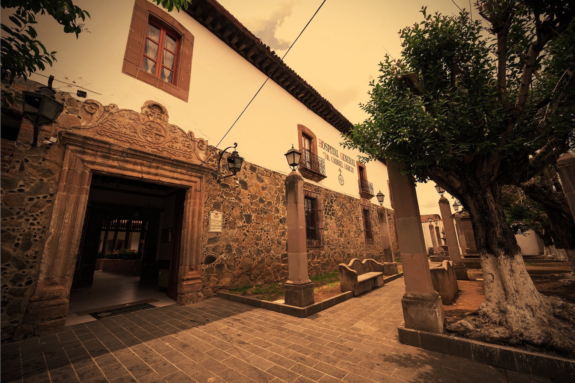 black and brown leather padded tub sofa
