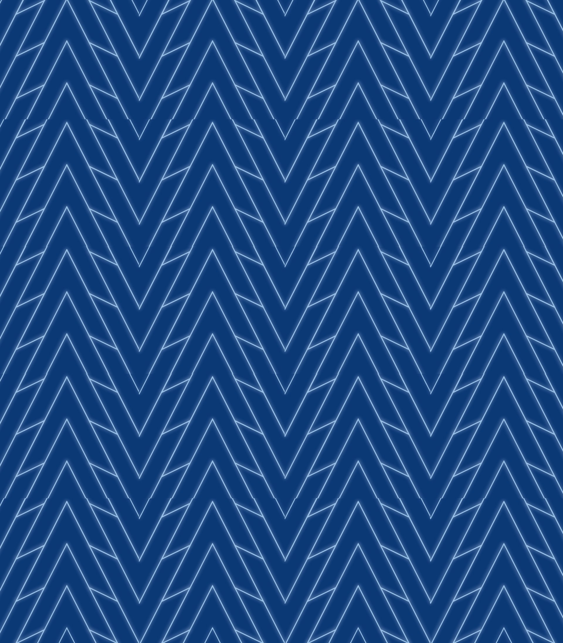 an abstract photo of a curved building with a blue sky in the background