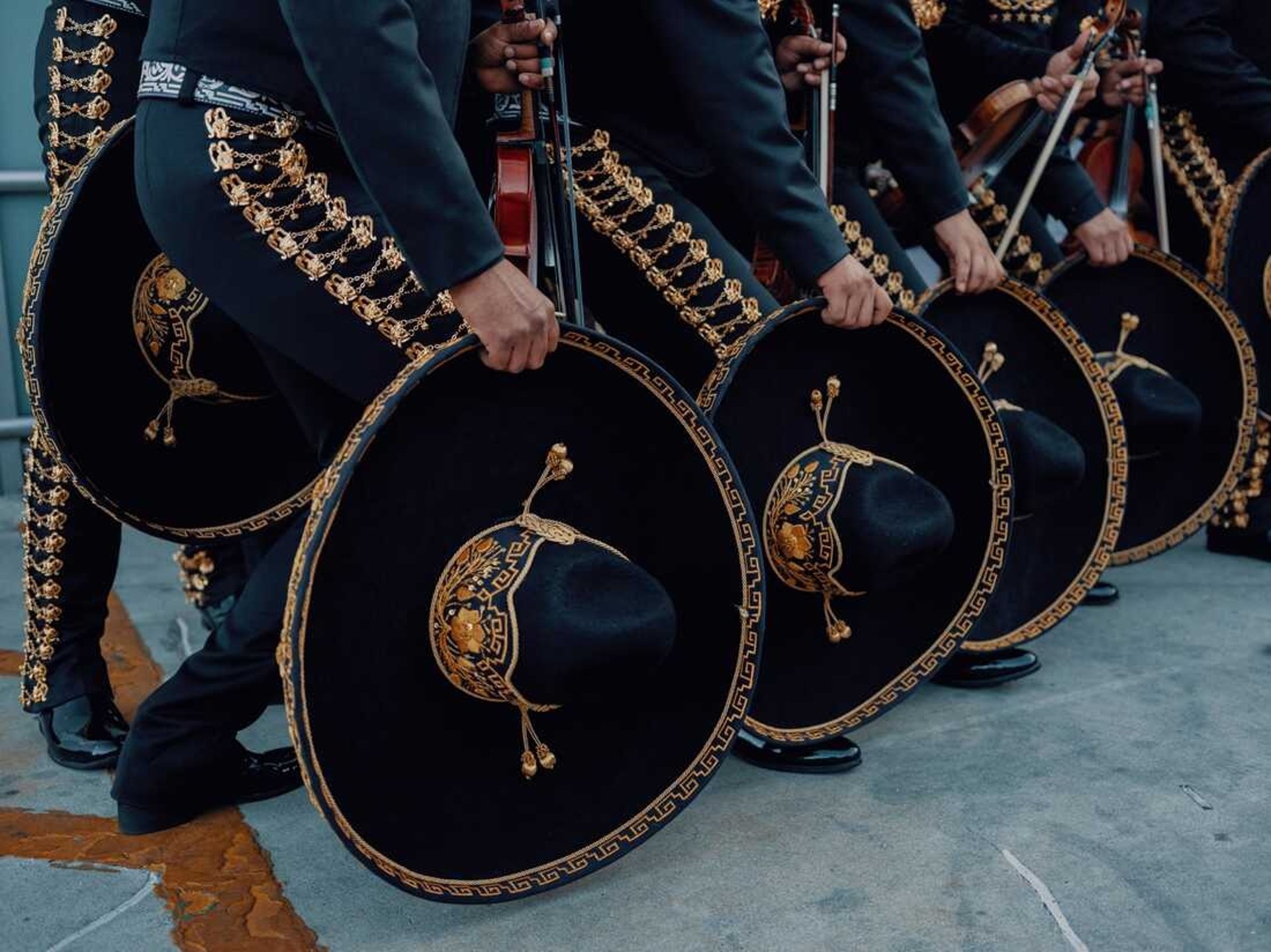 band playing on stage during daytime