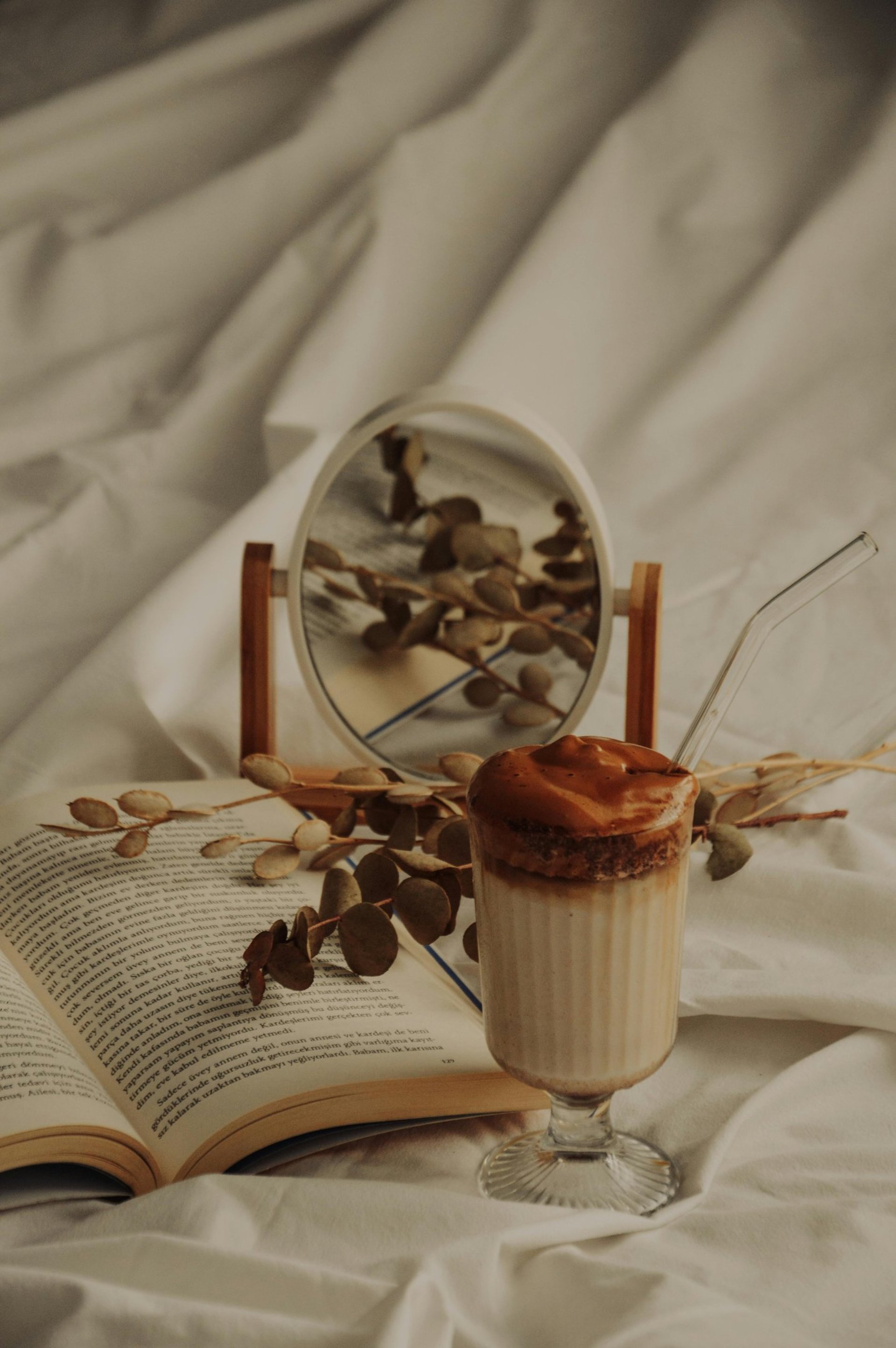 an abstract photo of a curved building with a blue sky in the background