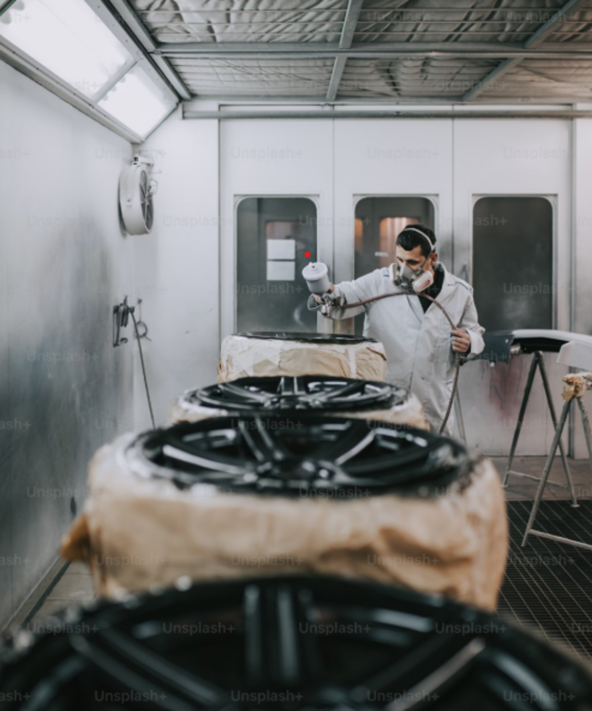 an abstract photo of a curved building with a blue sky in the background