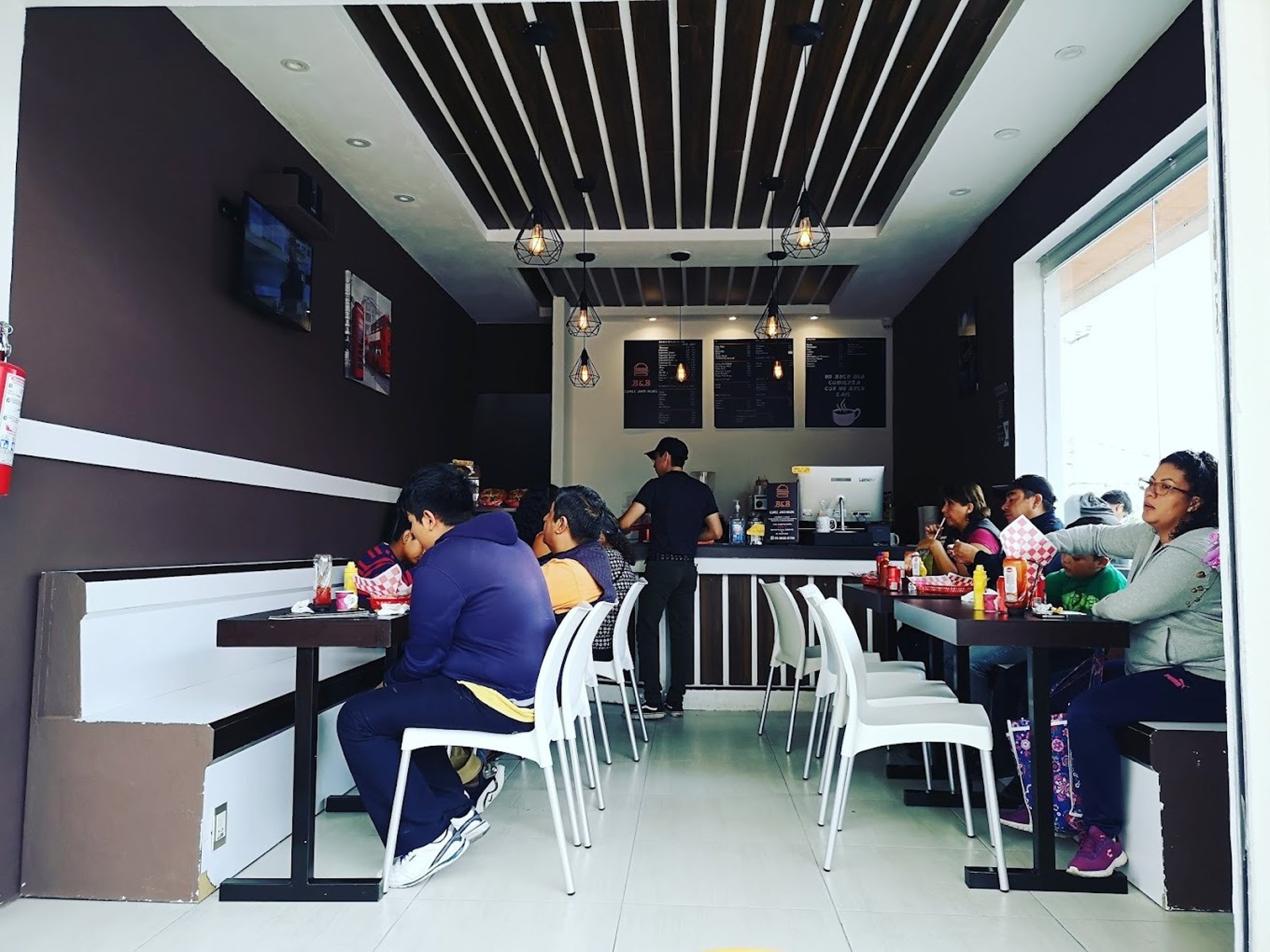 woman wearing yellow long-sleeved dress under white clouds and blue sky during daytime