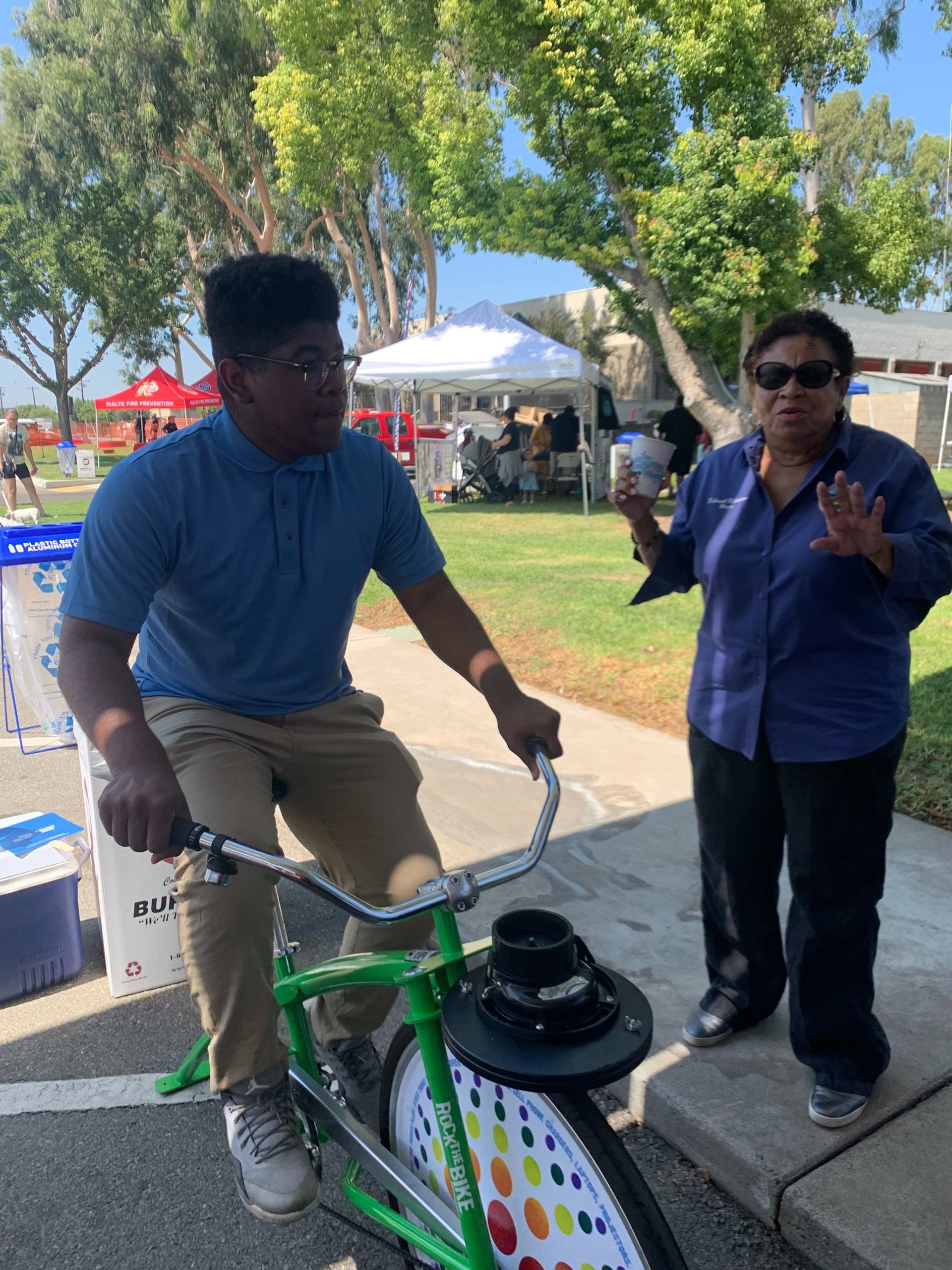 Enhancing Forward Action image of two people, one on a bike