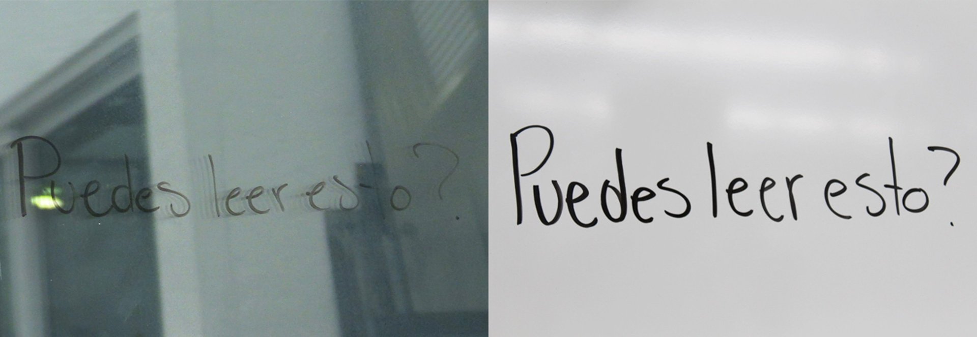 two people drawing on whiteboard