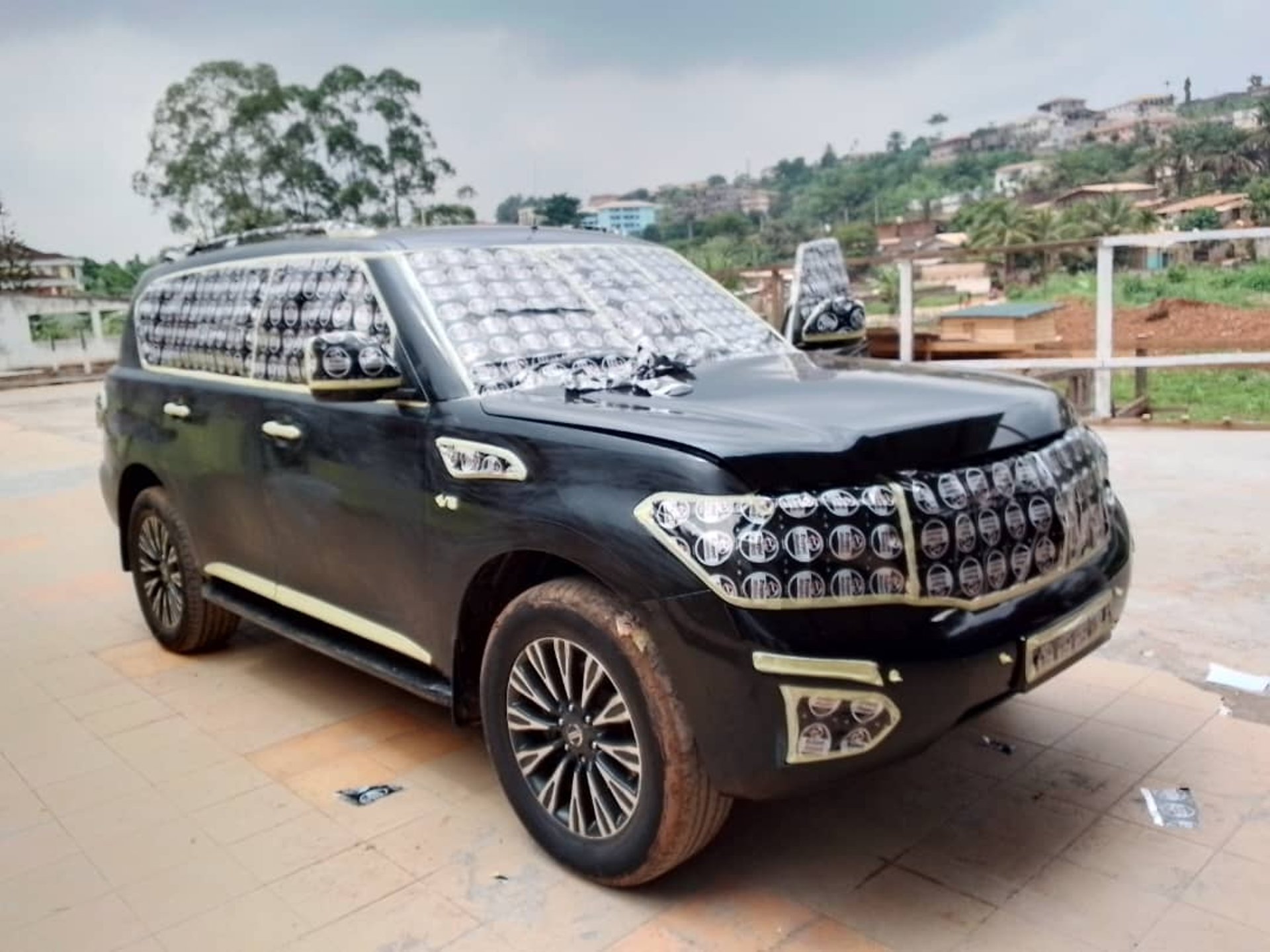 black and brown leather padded tub sofa