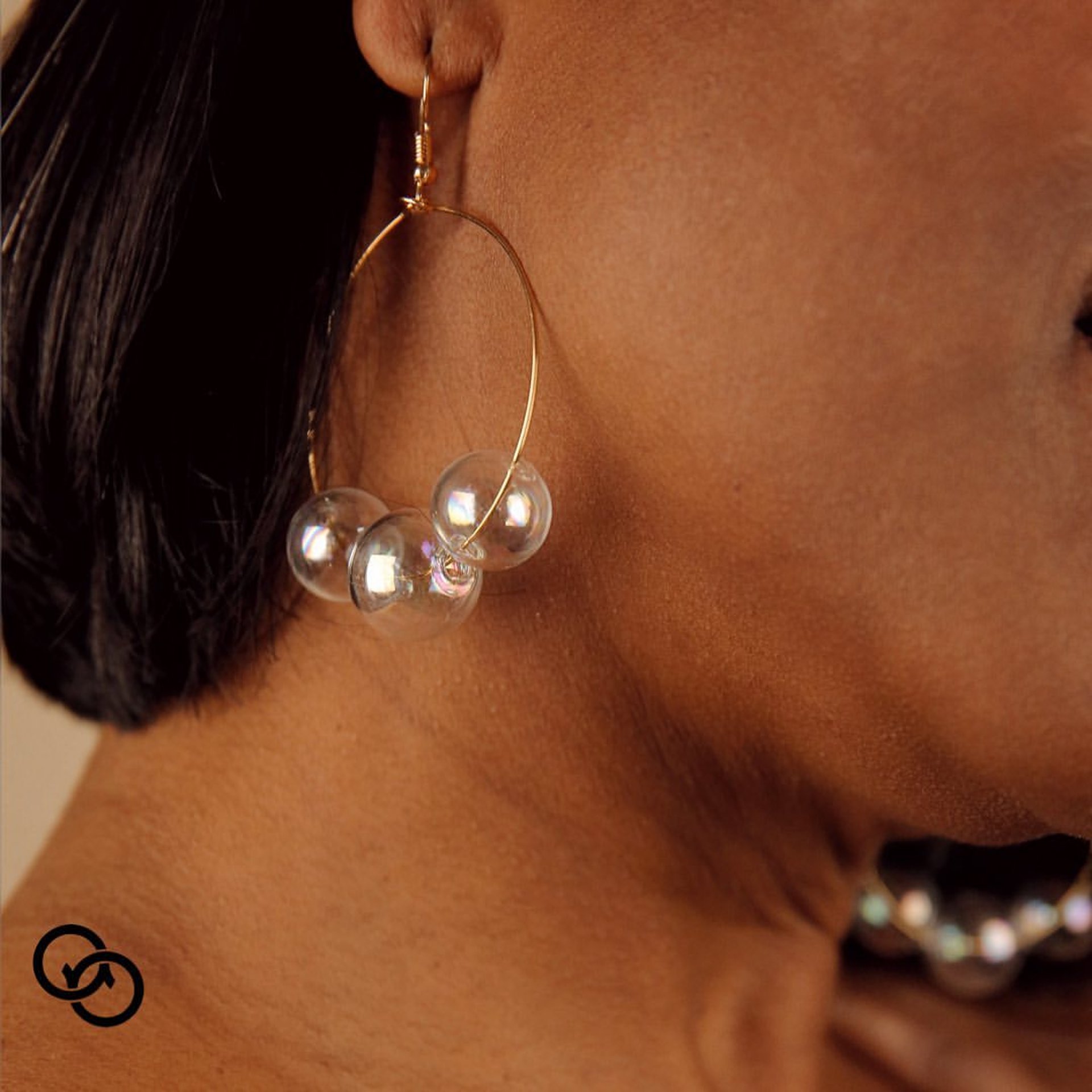 an abstract photo of a curved building with a blue sky in the background