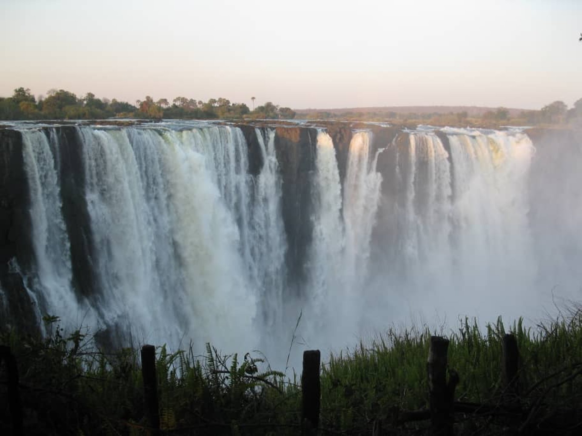 black and brown leather padded tub sofa