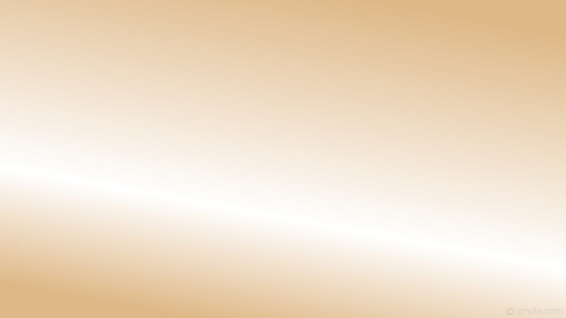 a plane flying through a cloudy blue sky