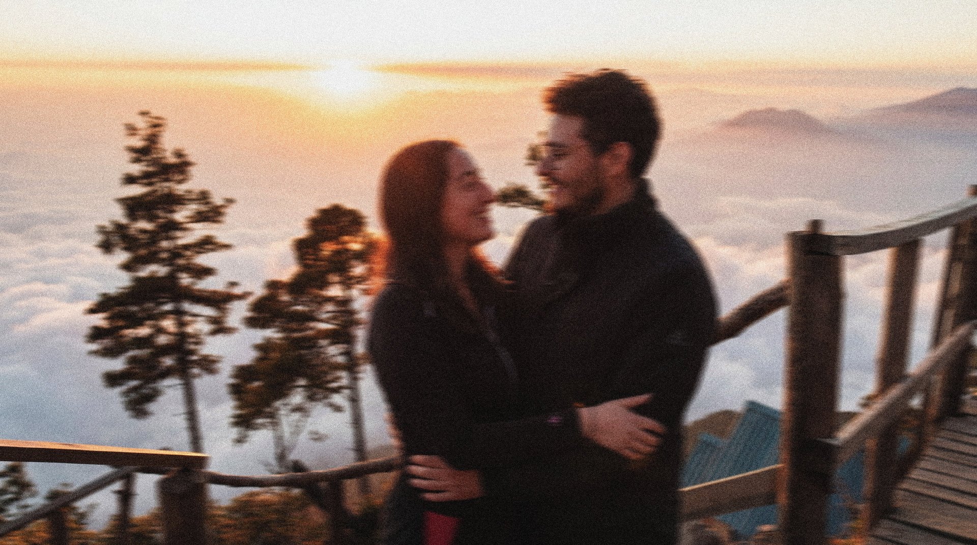 couple standing on rock during daytime
