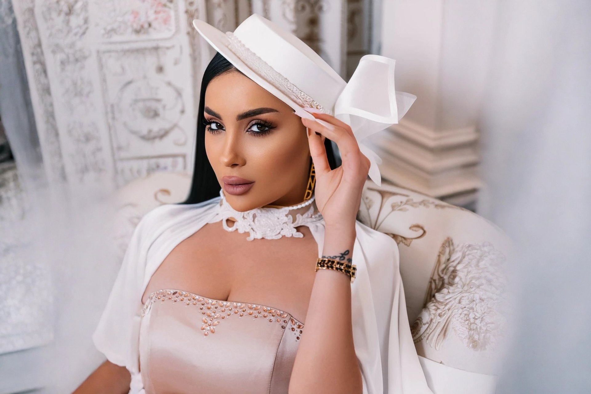woman wearing yellow long-sleeved dress under white clouds and blue sky during daytime