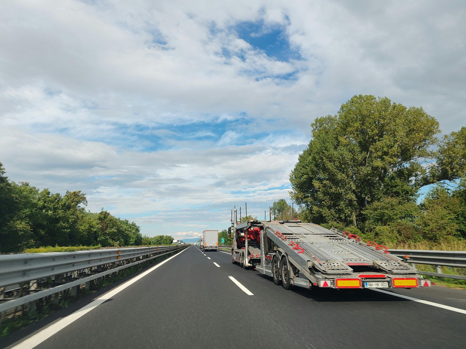 black and brown leather padded tub sofa