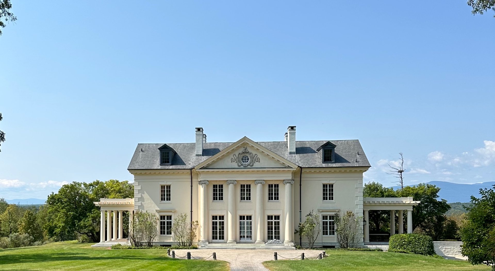 black and brown leather padded tub sofa