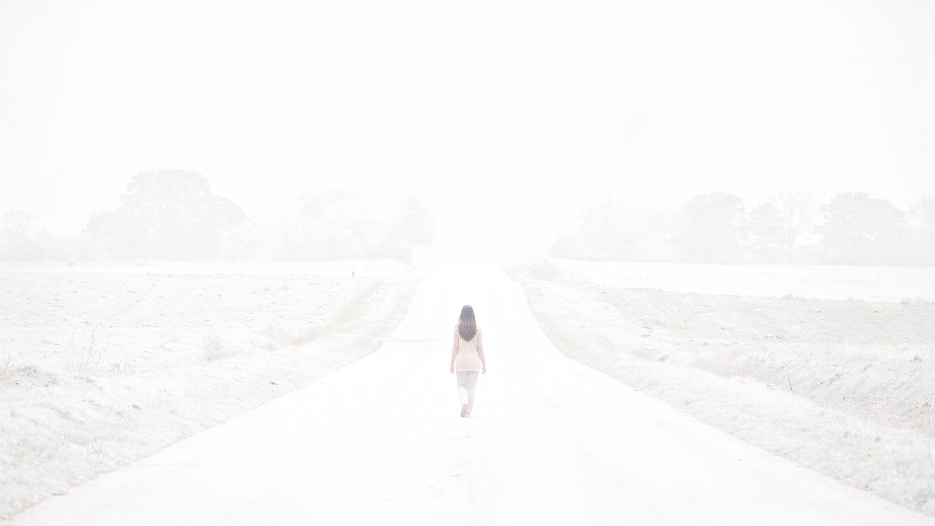 a person riding skis down a snow covered slope
