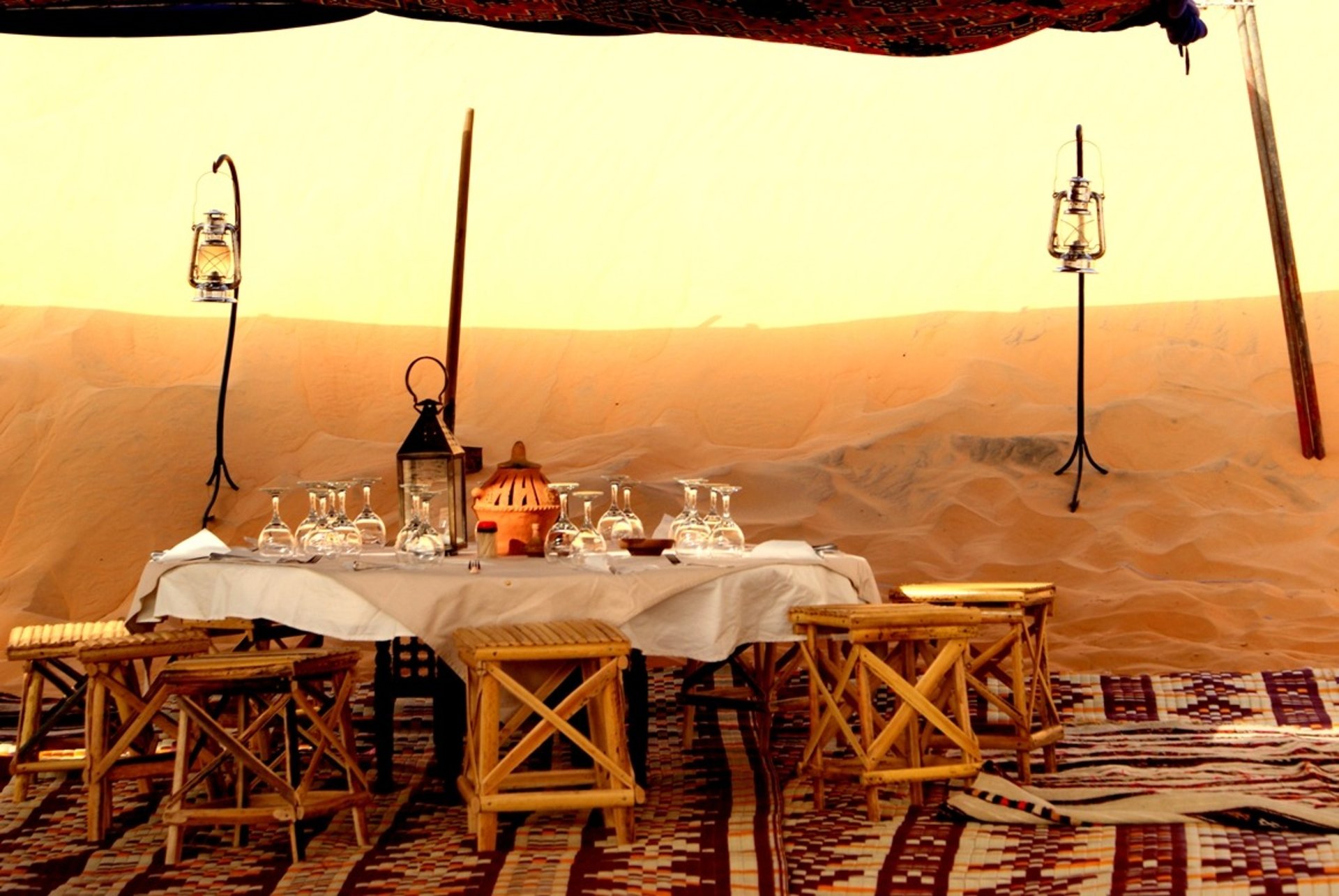 an abstract photo of a curved building with a blue sky in the background