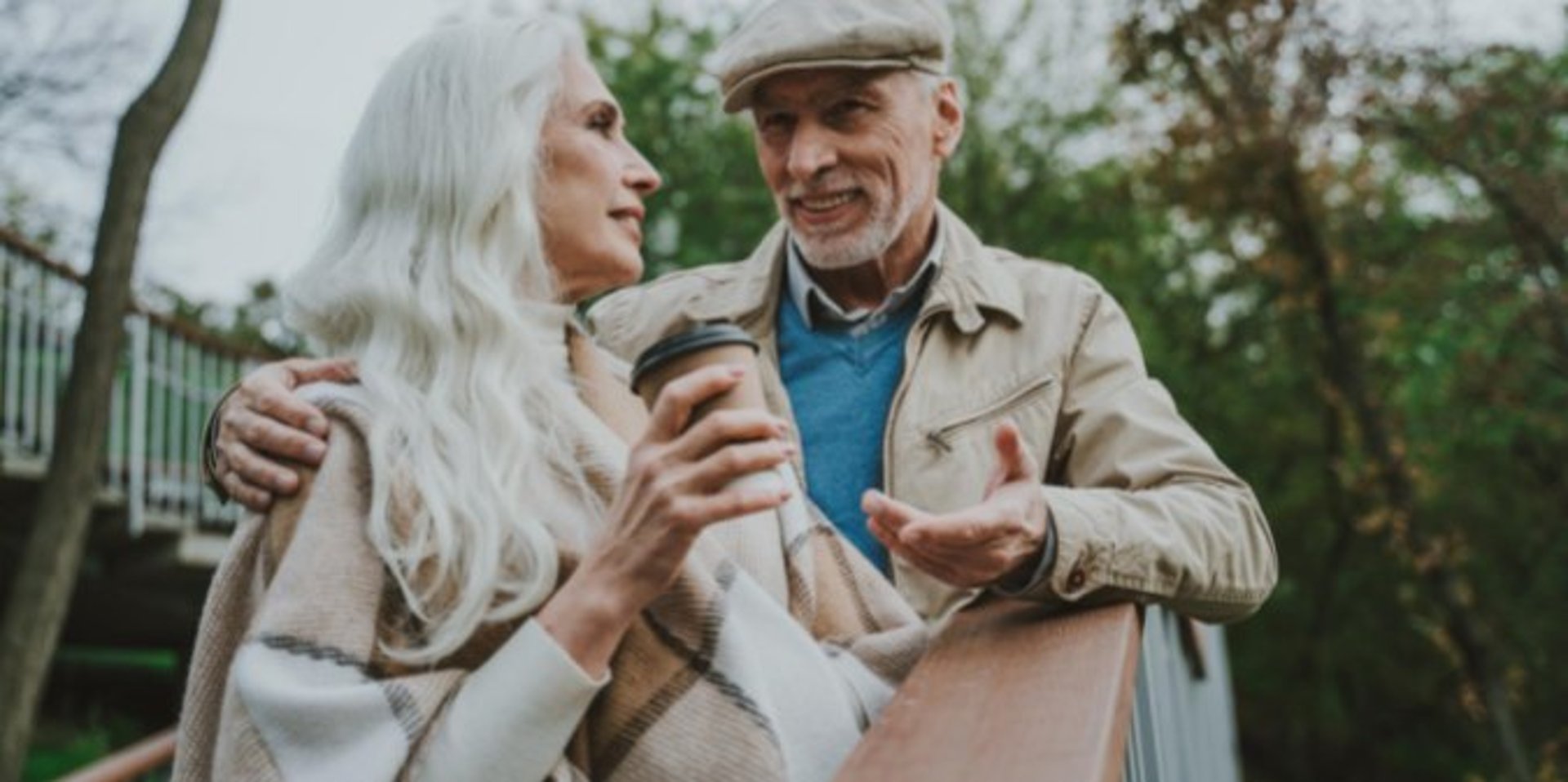 woman wearing yellow long-sleeved dress under white clouds and blue sky during daytime