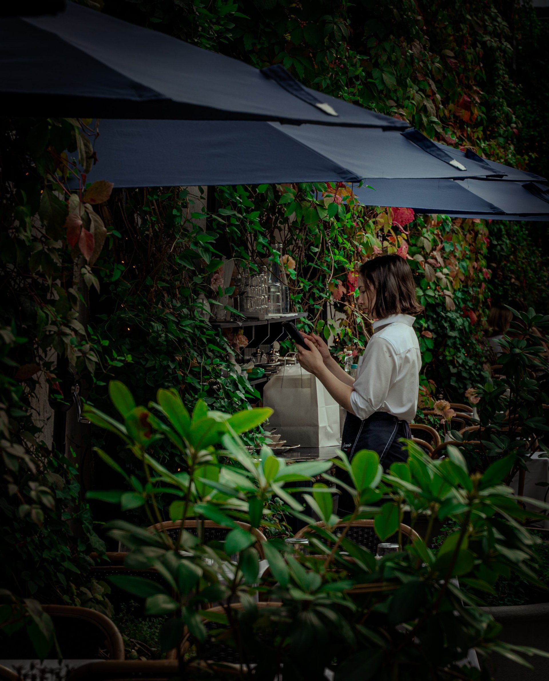 woman wearing yellow long-sleeved dress under white clouds and blue sky during daytime