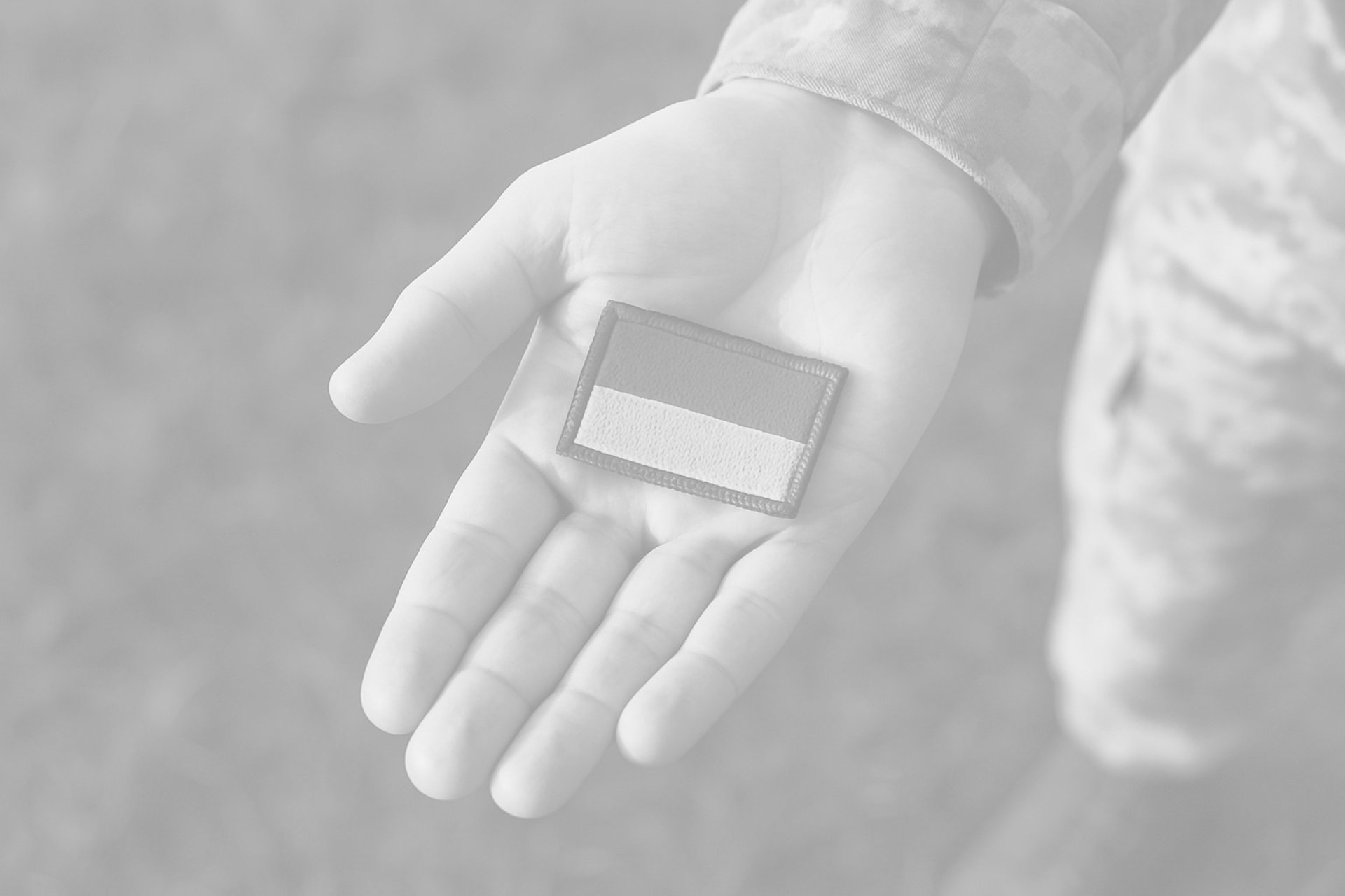 an abstract photo of a curved building with a blue sky in the background