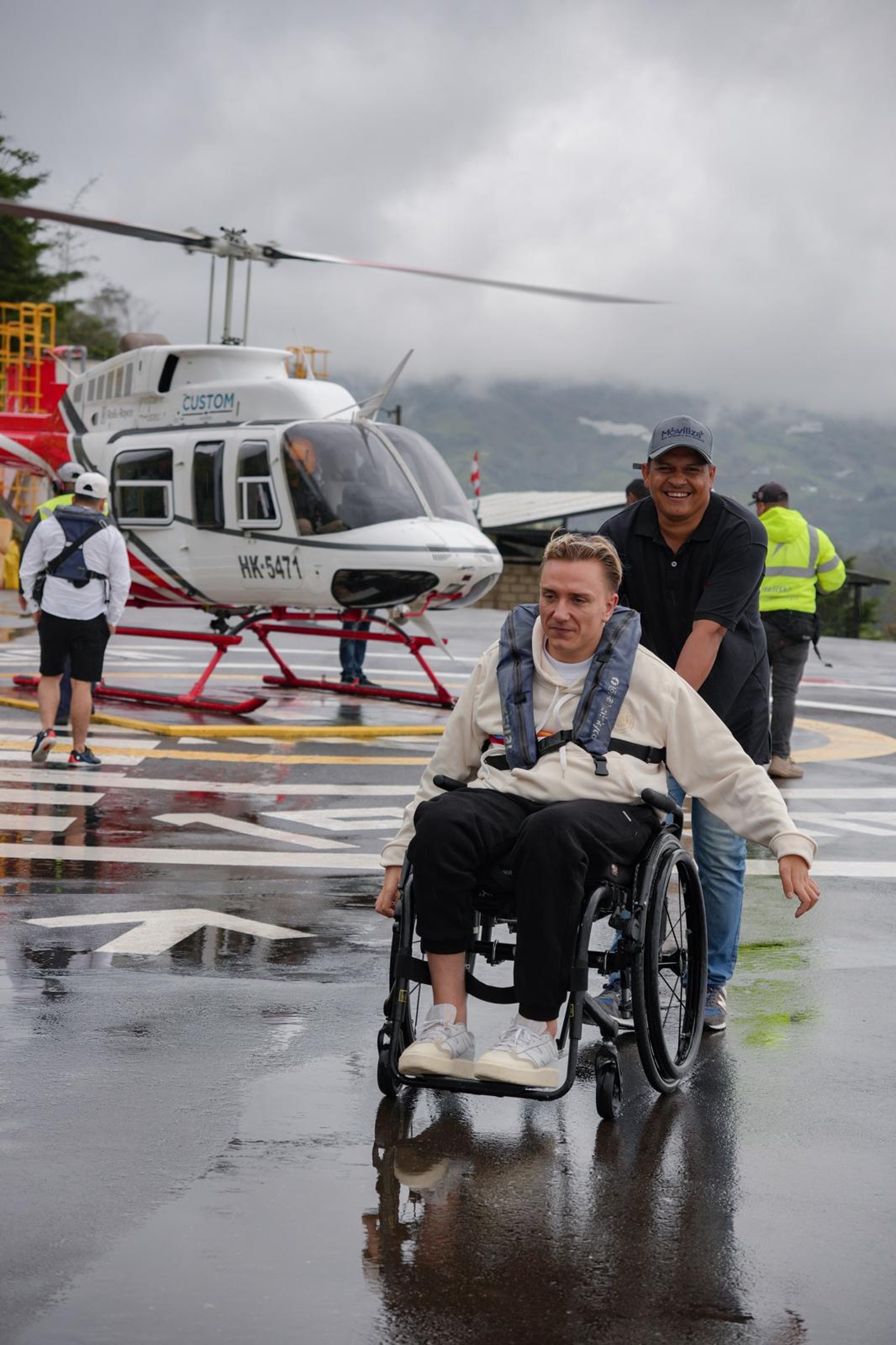 woman wearing yellow long-sleeved dress under white clouds and blue sky during daytime